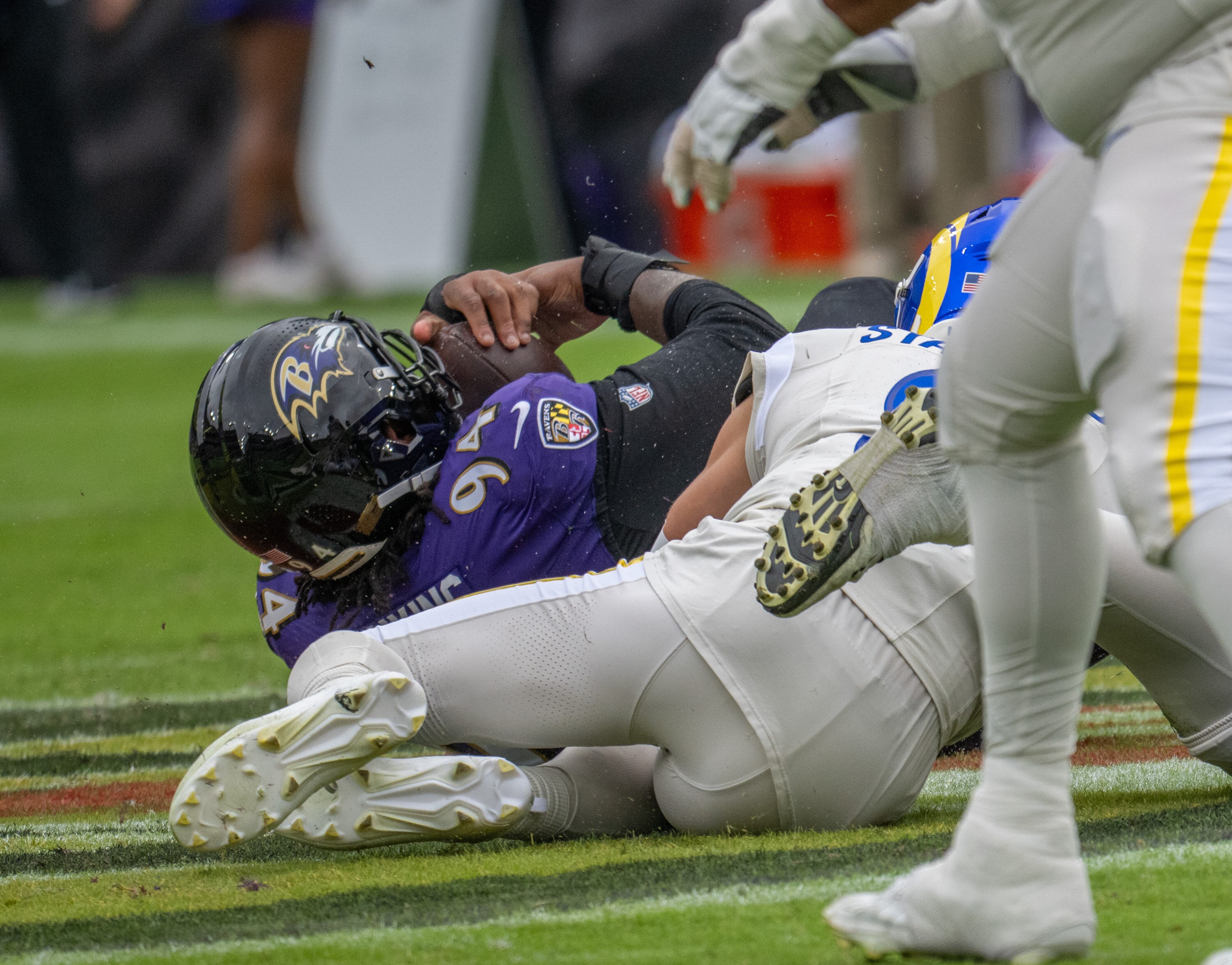 Sunday, Oct. 12, 2025 — Baltimore Ravens defensive tackle John Jenkins (94) comes up with the ball after a fumble by Los Angeles Rams quarterback Matthew Stafford (9) in the first quarter as the Ravens host the Rams at M&T Bank Stadium.