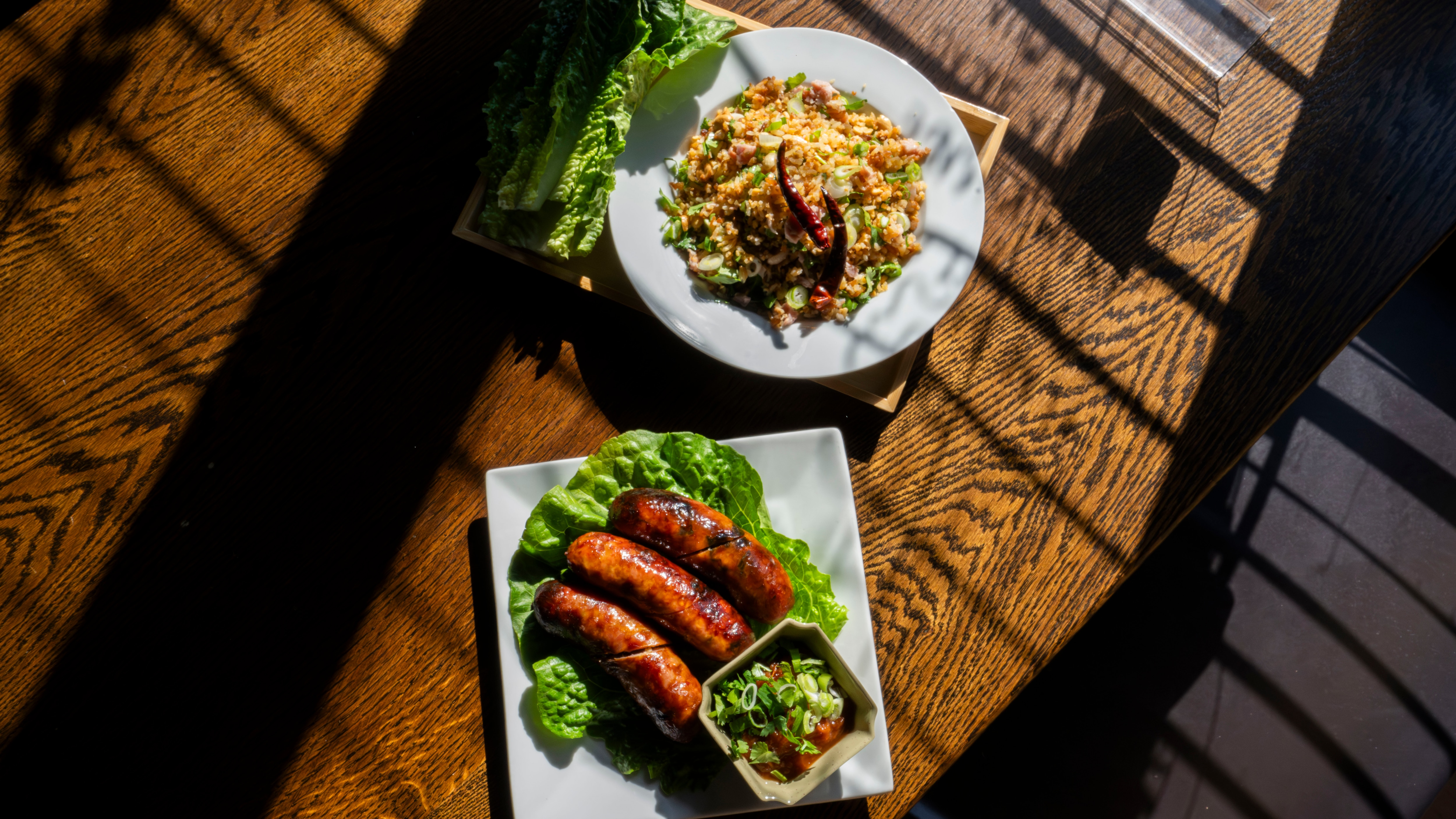 Lao sausages and stir fry, menu staples at Charming Elephant.