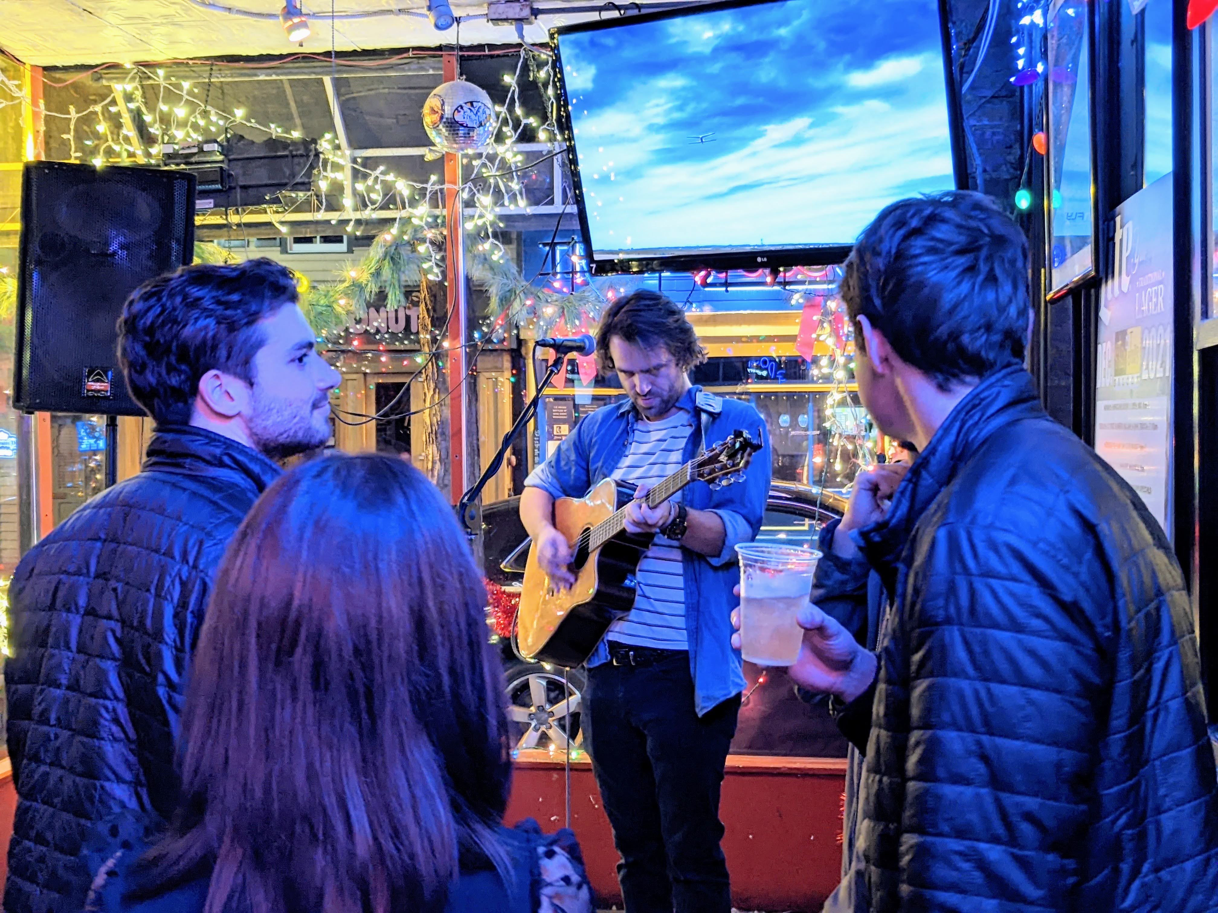 Musician Brendan Lane performs on the small stage at Stan & Joe's Saloon in Annapolis on Dec. 14, 2021. The bar hosts a variety of musicians in a close up setting.