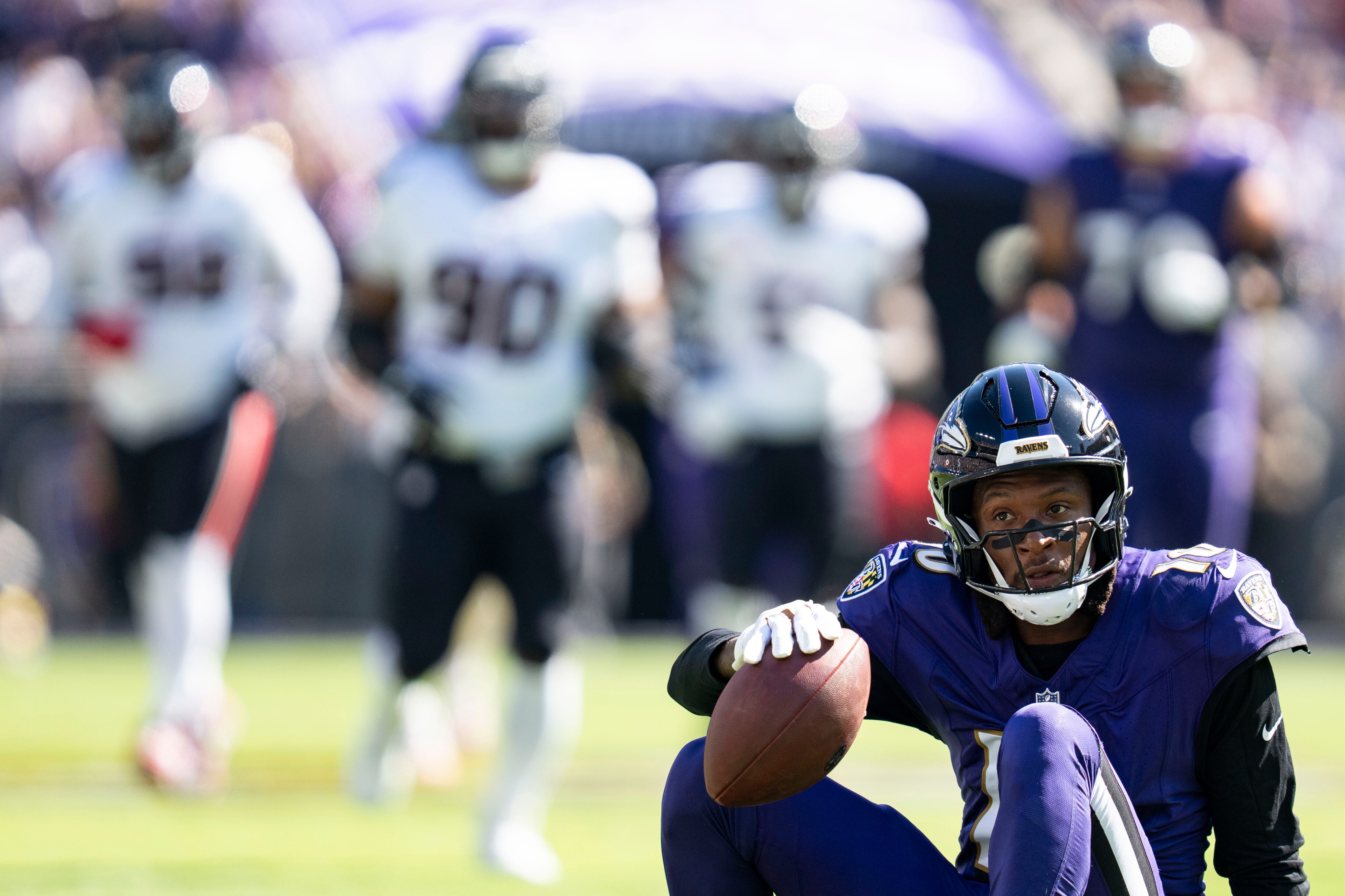 Ravens wide receiver DeAndre Hopkins gets up after being tackled during Sunday’s game against Houston.
