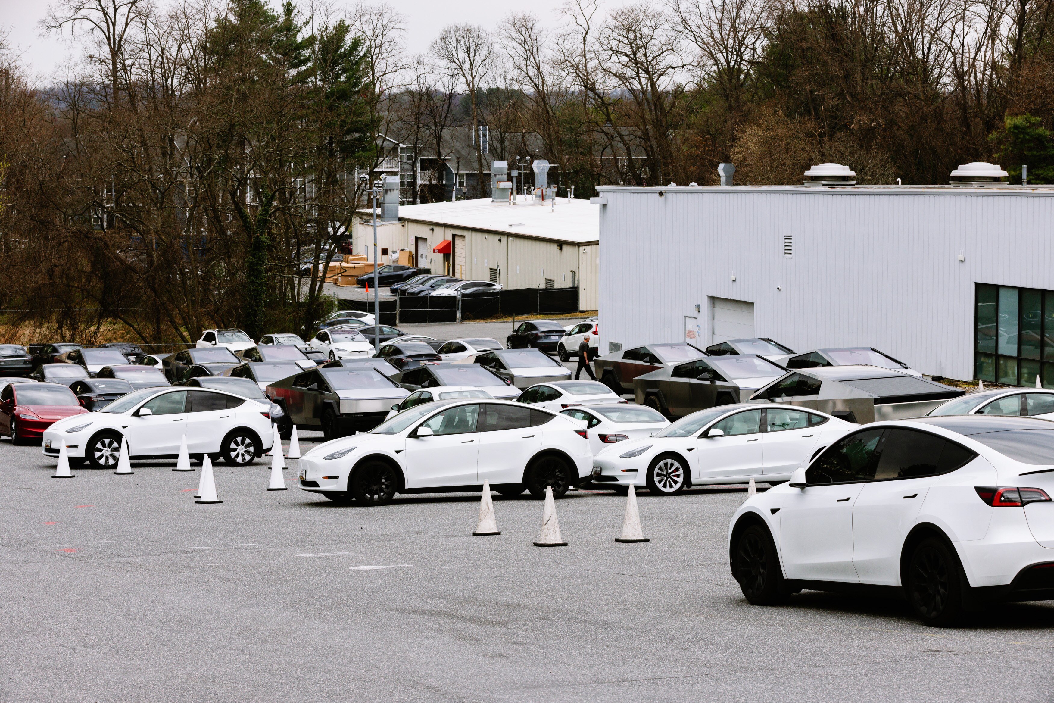 Teslas can be seen parked at the Tesla Dealership in Owings Mills, MD on Saturday, March 29, 2025.