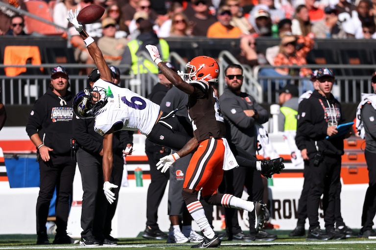 CLEVELAND, OHIO - OCTOBER 18: Ja'kobi Lane #6 of the Baltimore Ravens attempts to catch a pass against Denzel Ward #21 of the Cleveland Browns during the second quarter of the game at Huntington Bank Field on October 18, 2026 in Cleveland, Ohio. (Photo by Gregory Shamus/Getty Images)