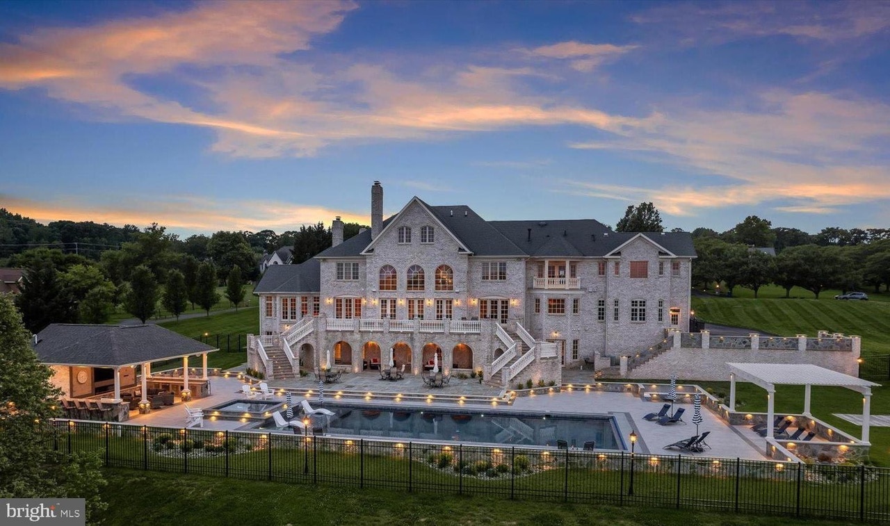 A stunning backyard is one of the highlights of the home, with luxurious resort-style amenities.