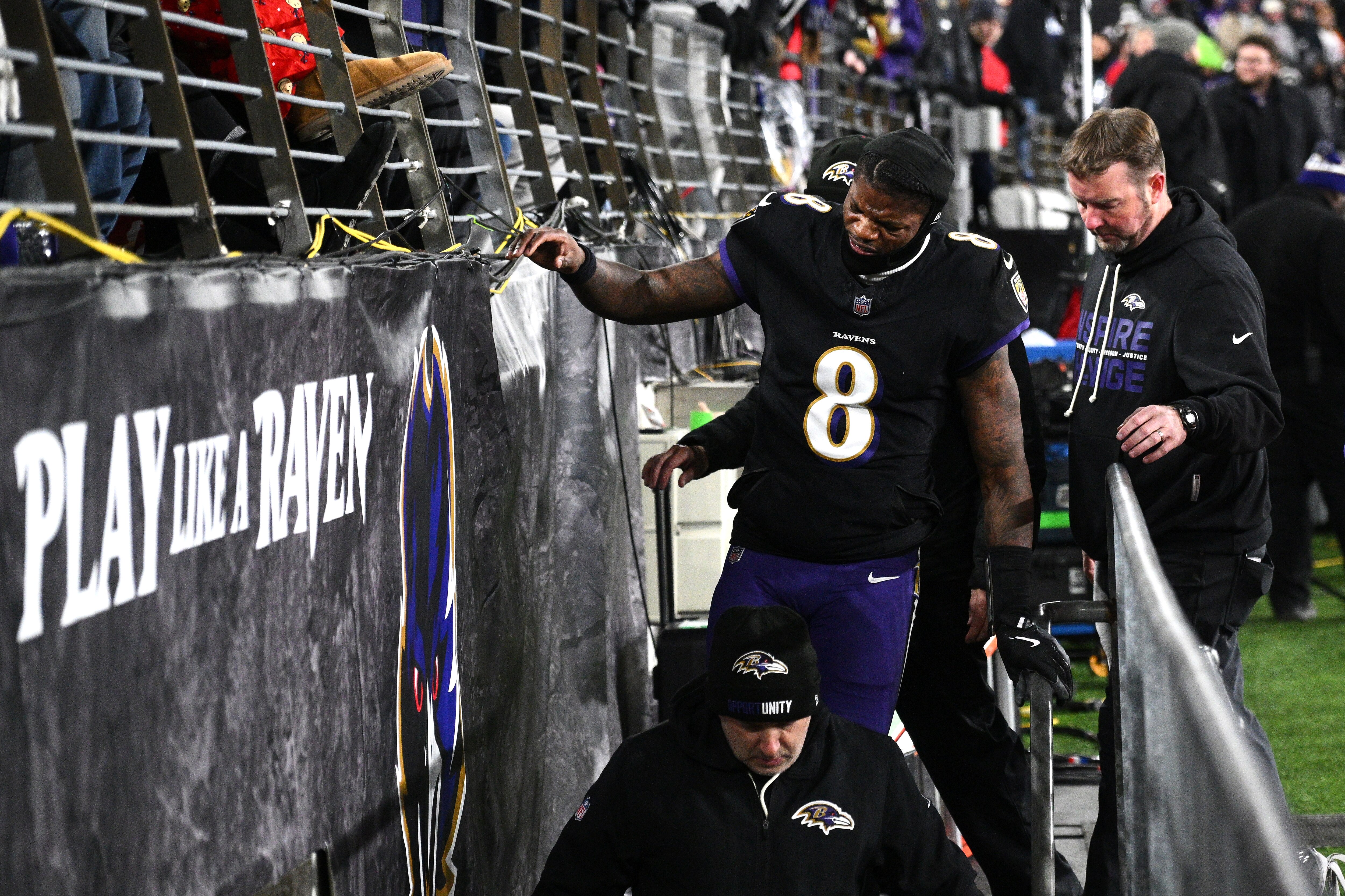 Baltimore Ravens quarterback Lamar Jackson (8) leaves the field during the first half of an NFL football game against the New England Patriots, Sunday, Dec. 21, 2025, in Baltimore.