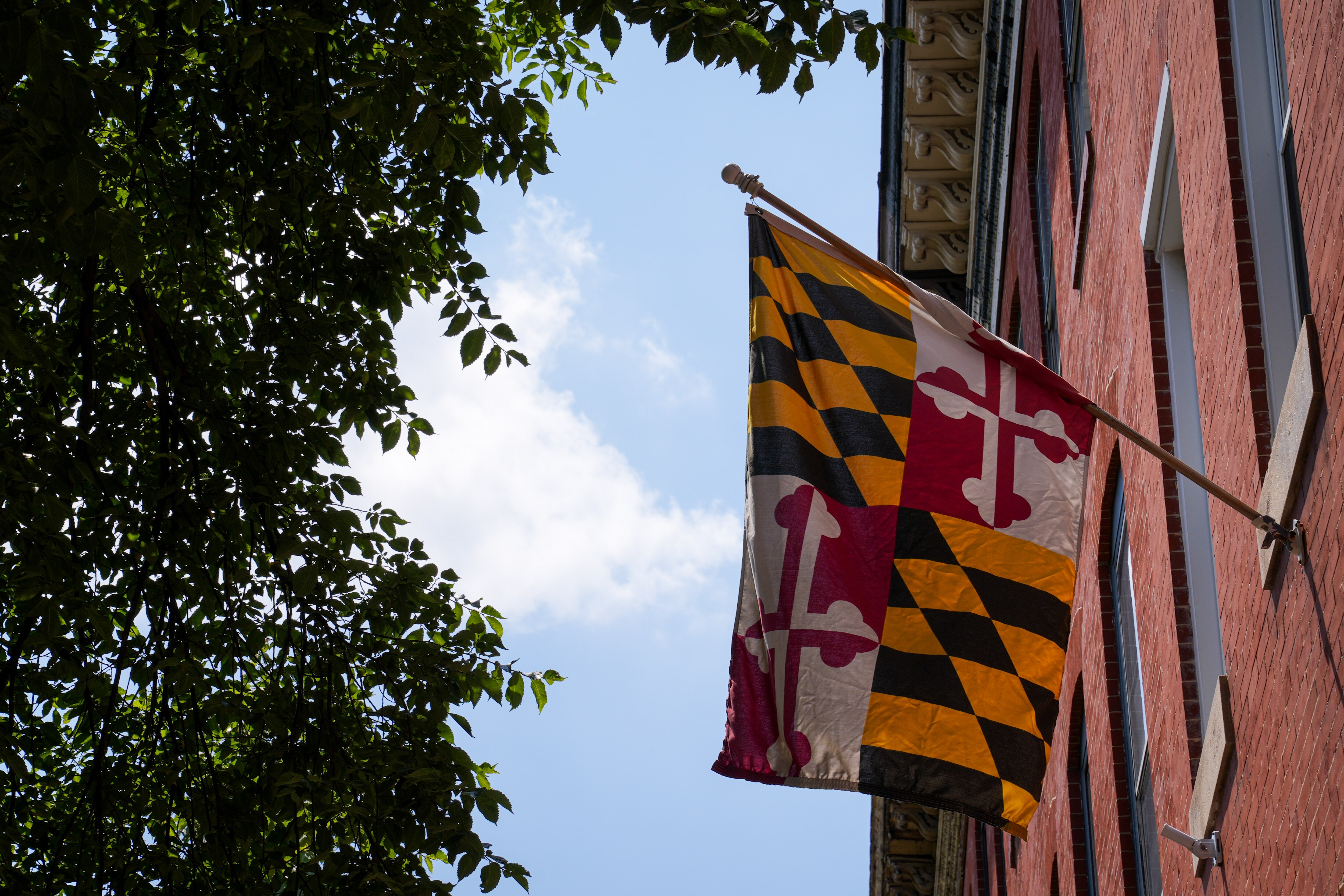 A Maryland flag hangs from a home in Upper Fells Point.
