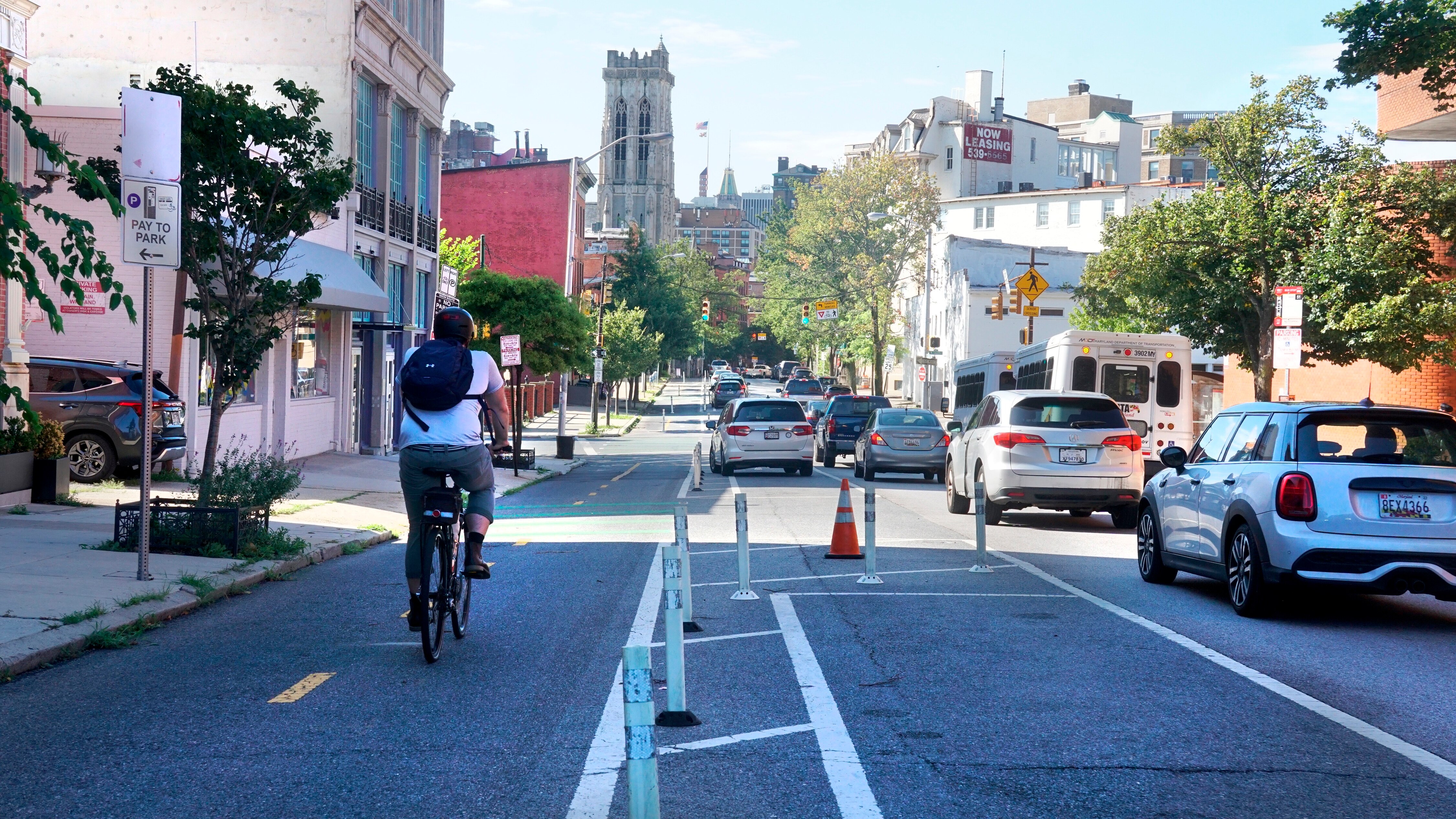 Bike advocates say separated lanes like the one that runs along Maryland Avenue in Baltimore help to calm traffic and create safer streets for cyclists.