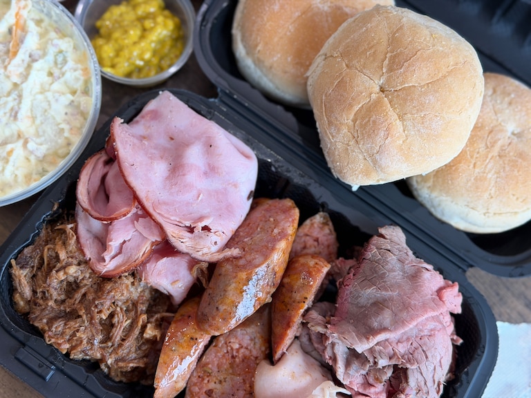 The "Tour of Meatman" at Meat Man Pit Beef & Catering comes loaded with pit beef, pit ham, pit turkey, pulled pork and Roma Italian sausage.