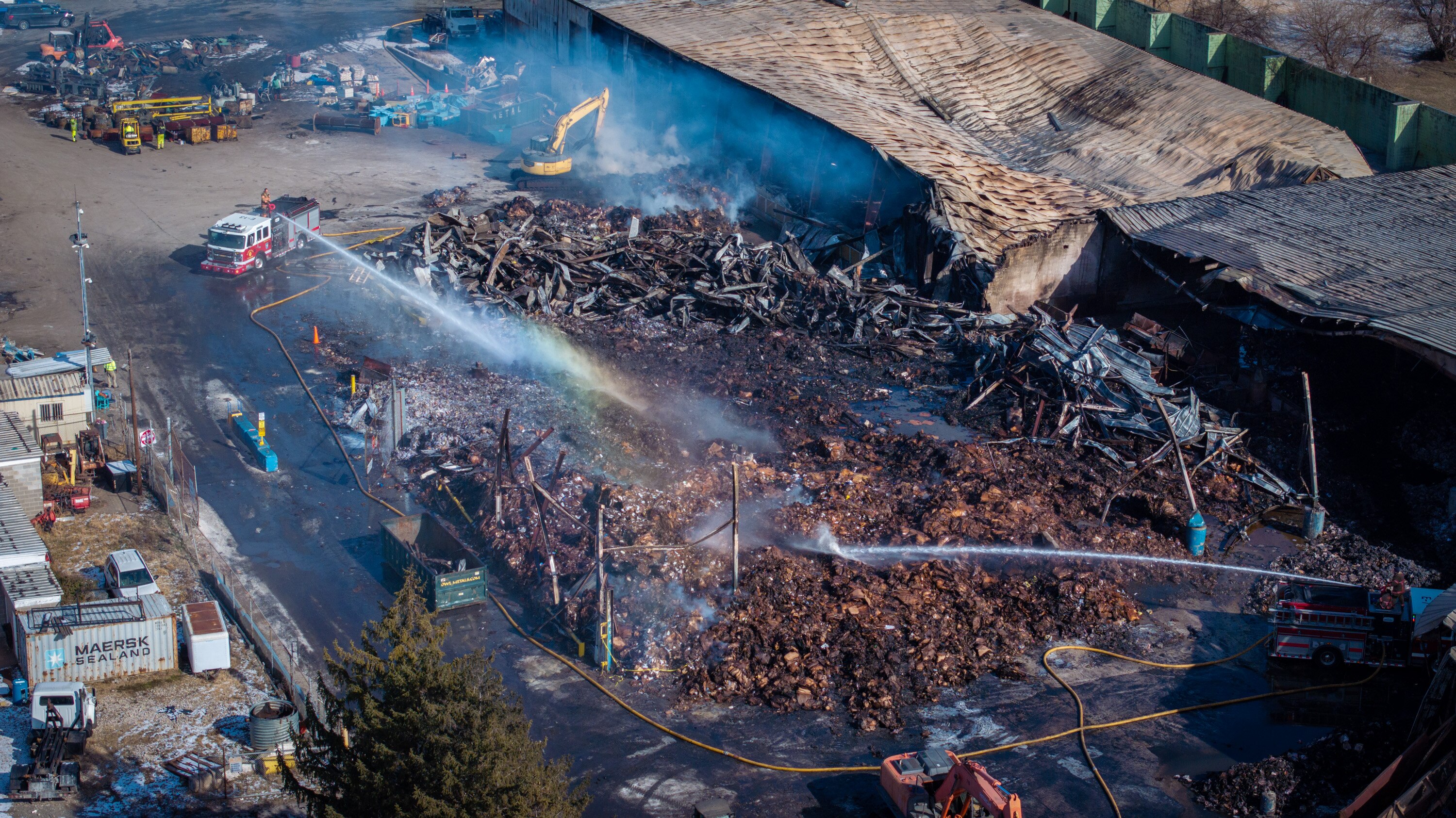 Baltimore County firefighters are back on the seen at a metal recycling facility in Dundalk where a fire that had burned over the weekend rekindled Thursday.