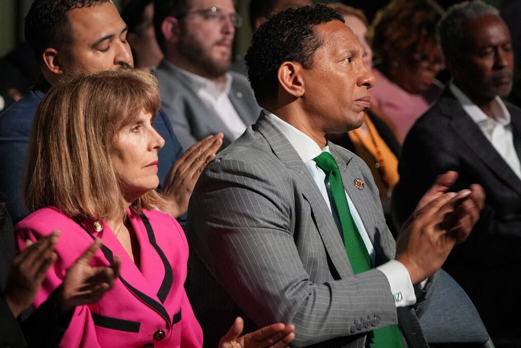 Baltimore City Inspector General Isabel Cumming and State’s Attorney Ivan Bates applaud as Mayor Brandon Scott gives the annual State of the City address on Monday, April 17. The event was held at the Middle Branch Fitness and Wellness Center in South Baltimore.