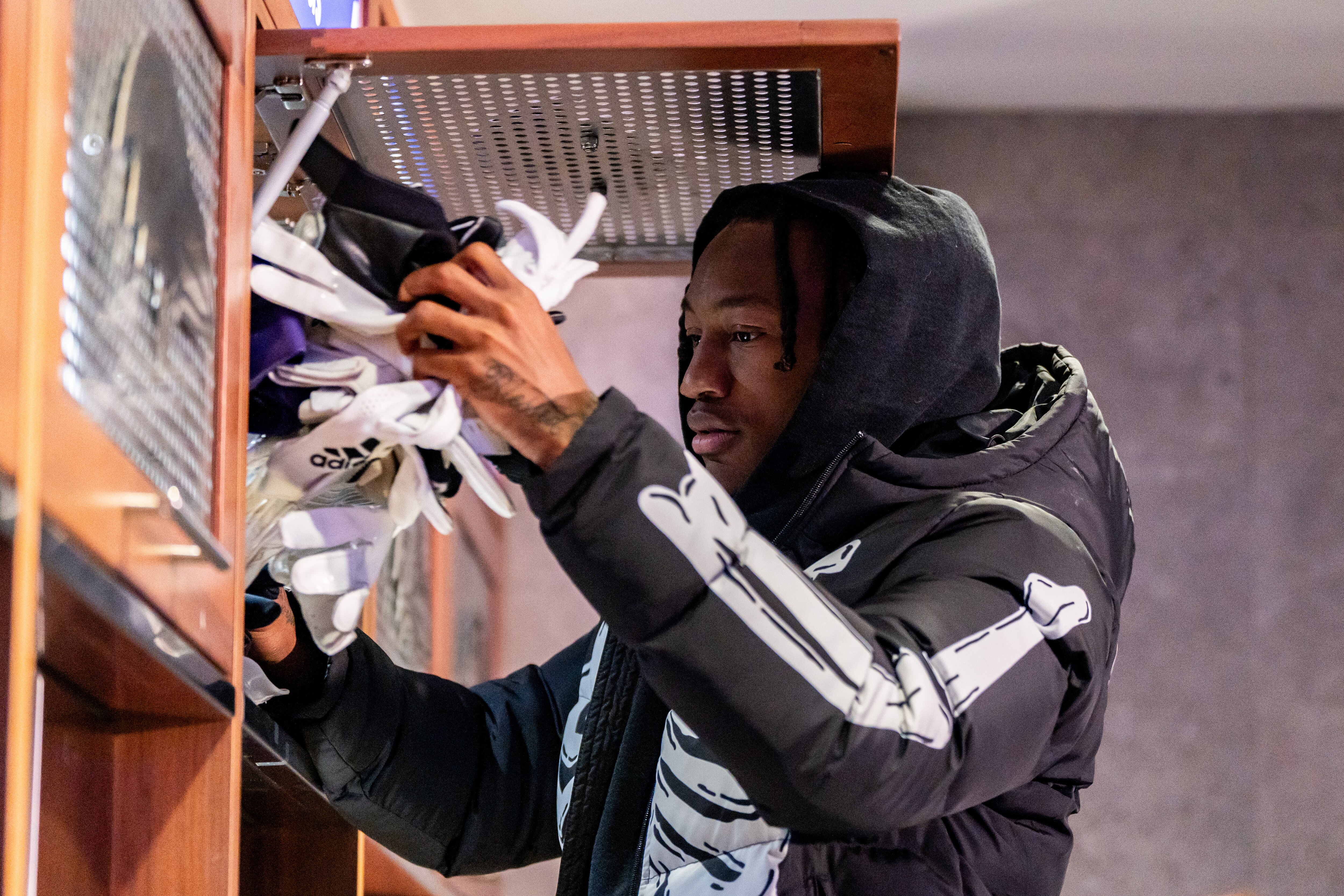 Ravens wide receiver Zay Flowers cleans out his locker on Monday, Jan. 29, 2024.