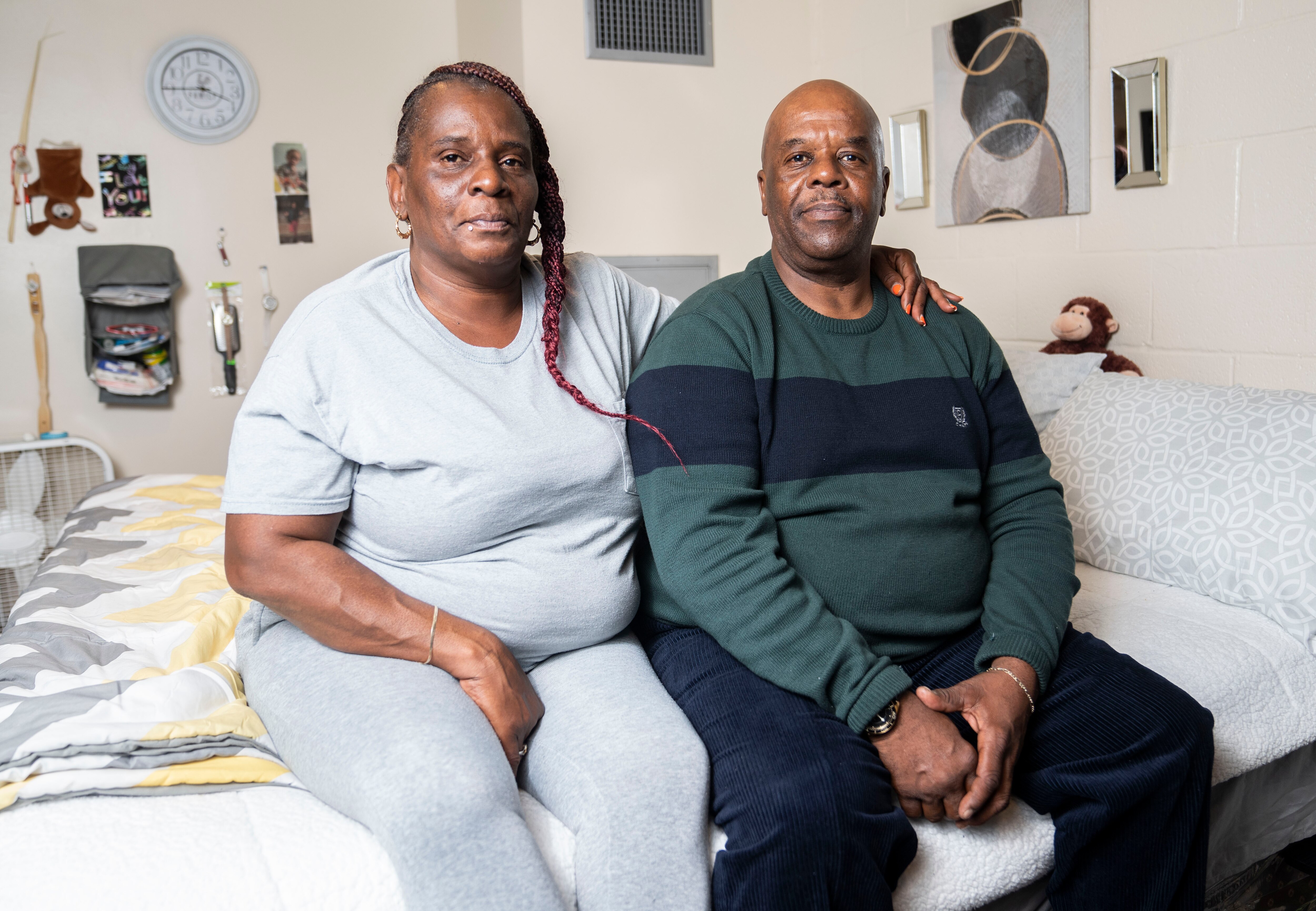 Darlene Lewis and John Lewis pose for a portrait inside of their home, in Baltimore, Thursday, December 7, 2023. 