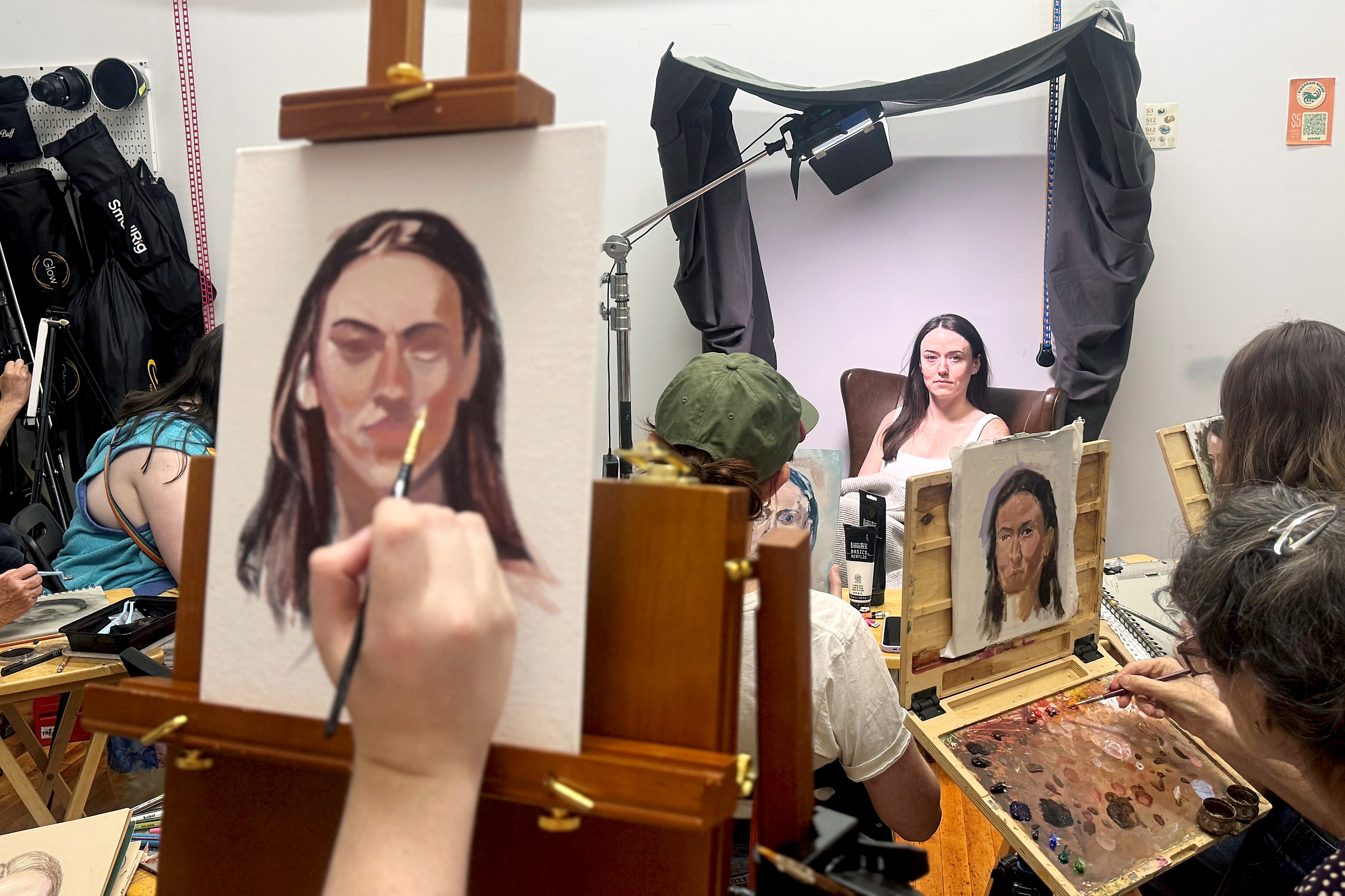 AUGUST 25, 2025 - Evelyn sits for a portrait with 100 Heads Society in August.