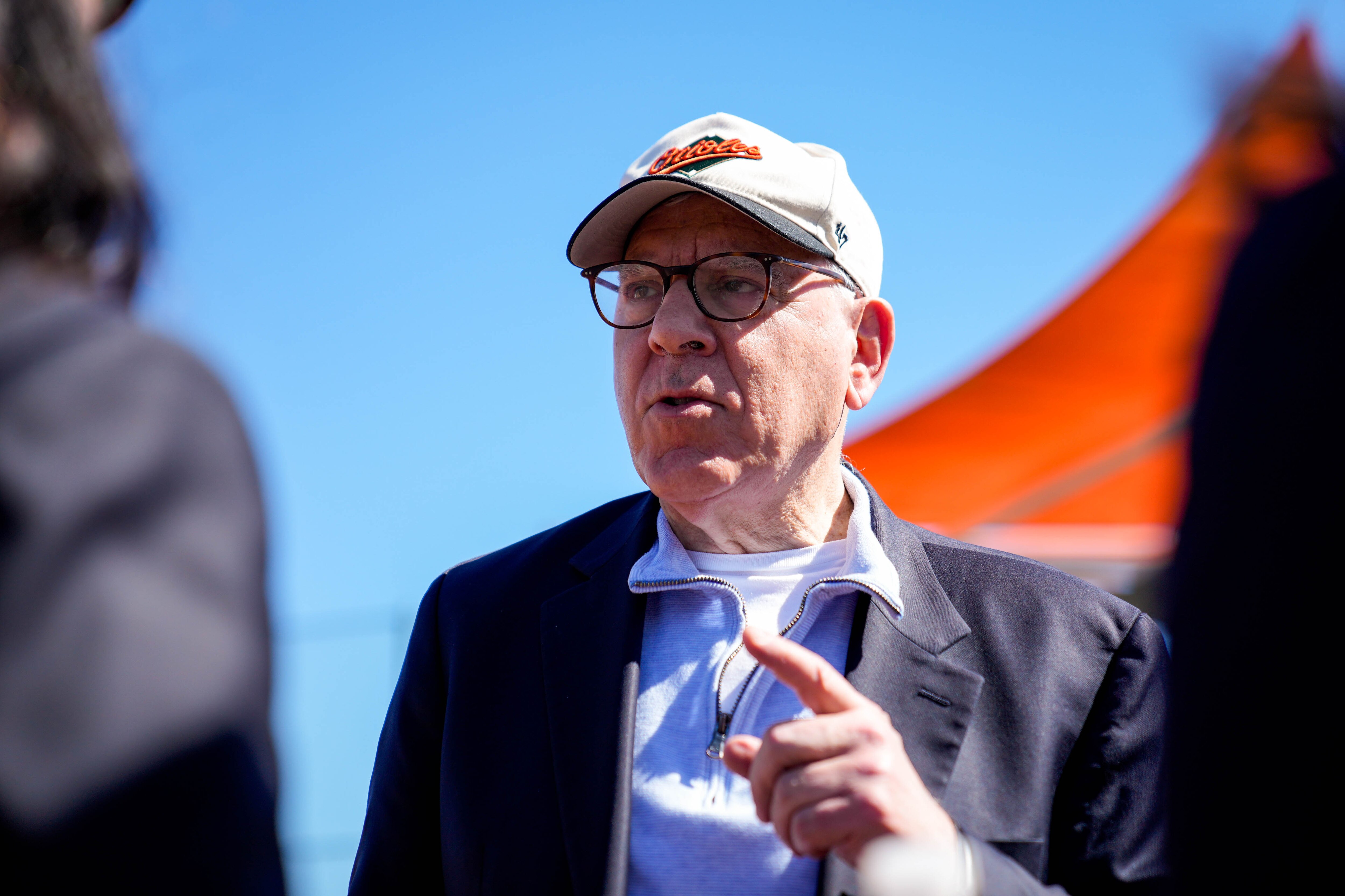 Baltimore Orioles owner David Rubenstein speaks with guests visiting Ed Smith Stadium during spring training in Sarasota, Florida, on Monday.