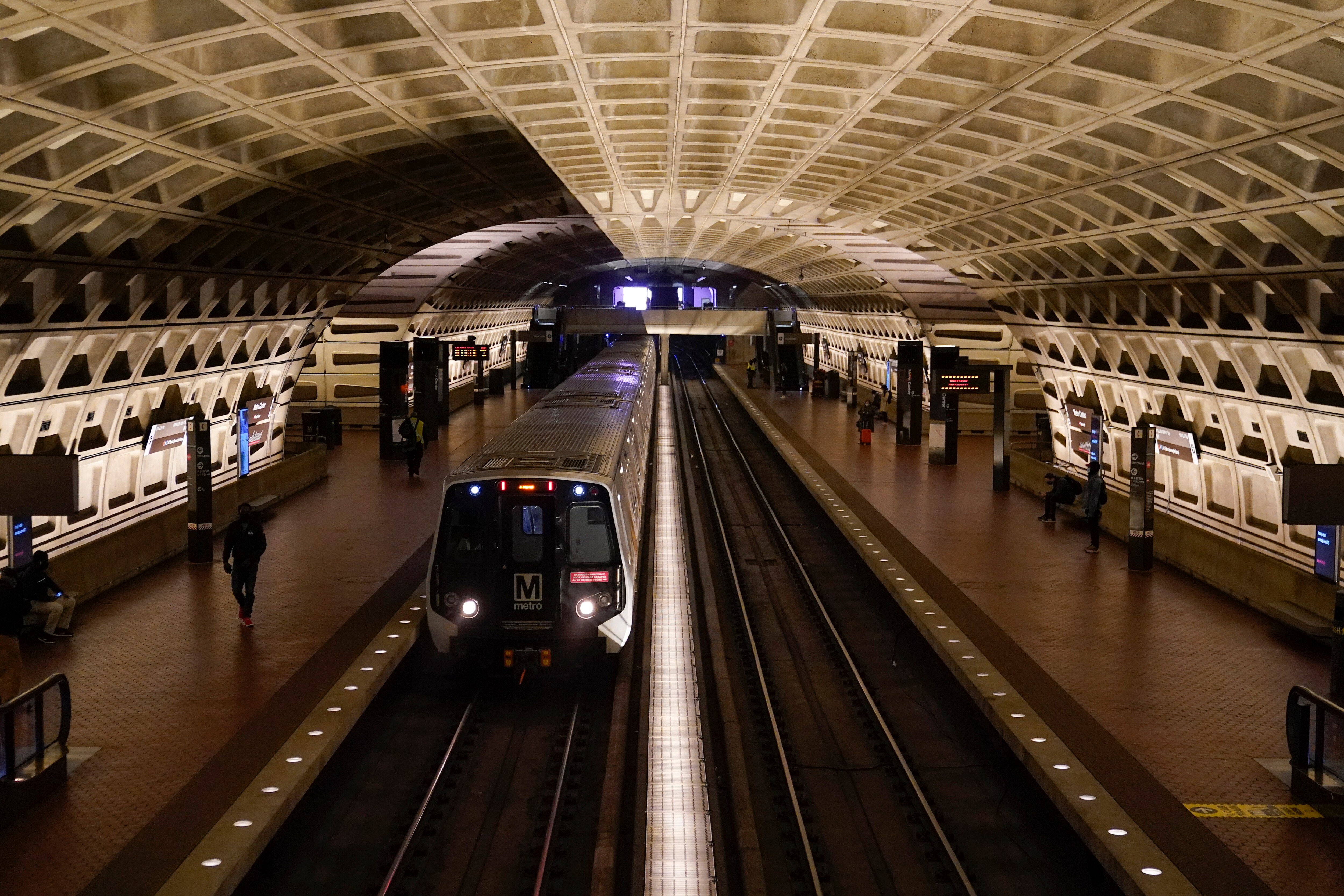 A train arrives at Metro Center station, April 23, 2021, in Washington. Federal officials are harshly criticizing Washington's regional transit agency, saying a “poor safety culture” led to an October 2021 derailment that caused hundreds of new Metro railcars to be pulled from service. (AP Photo/Patrick Semansky, File)