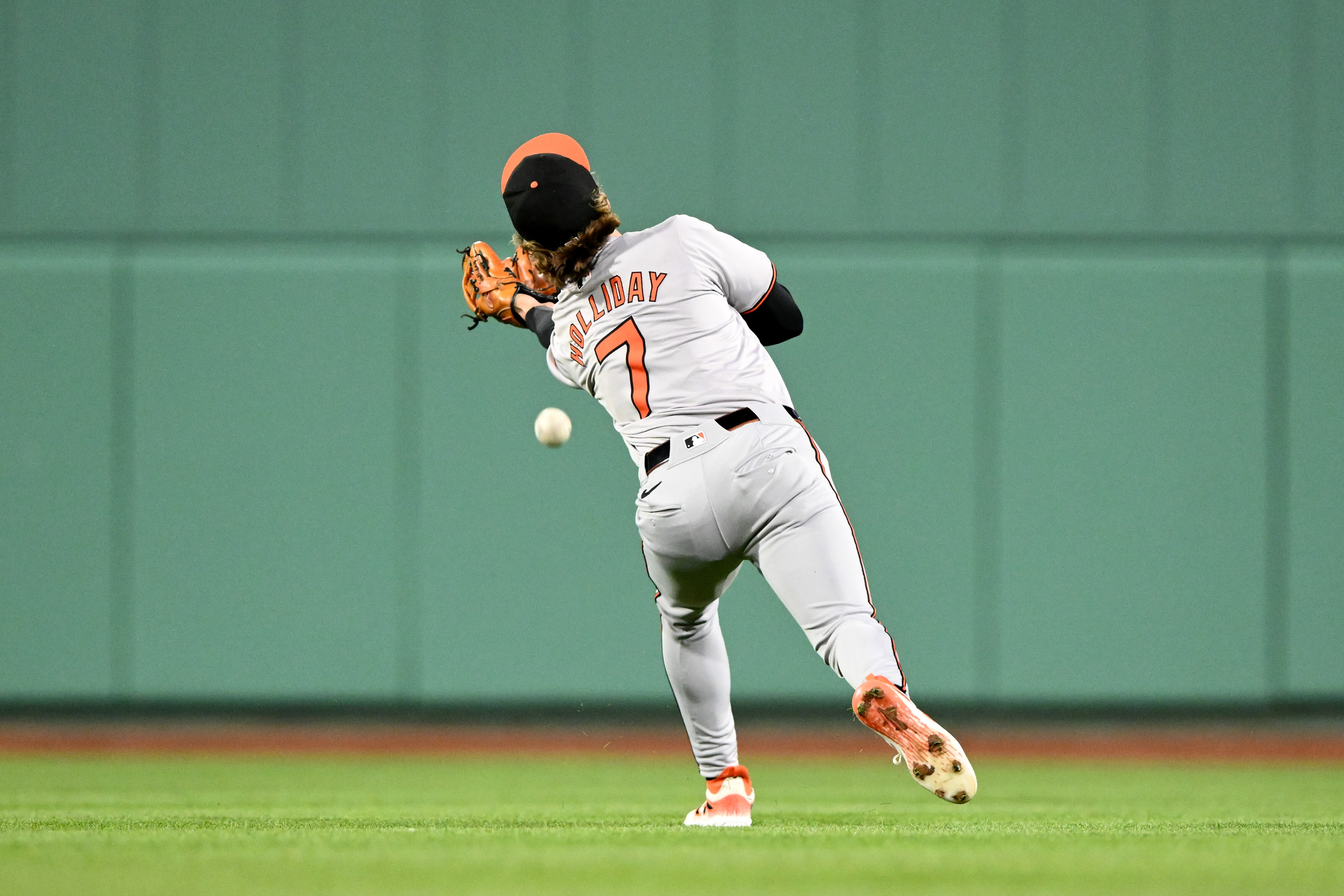 Jackson Holliday fails to catch a blooper by Tyler O’Neill of the Red Sox, allowing Boston’s first run to score Wednesday night during the Orioles’ 7-5 win.