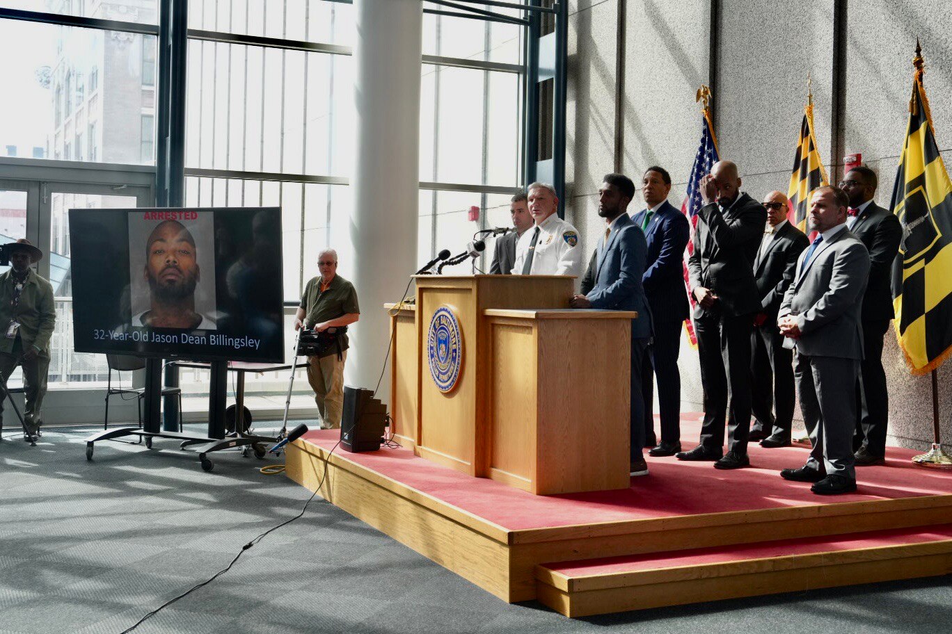 Baltimore Acting Police Commissioner Richard Worley, U.S. Marshals Chief Deputy Mathew Silverman, Baltimore Mayor Brandon M. Scott, and Baltimore City State's Attorney Ivan J. Bates host a press conference at police headquarters on the arrest of Jason Billingsley, the suspect in the killing of Pava LaPere, on Sept. 28, 2023. Billingsley was apprehended at a train station in Bowie late last night. (Kaitlin Newman/The Baltimore Banner)