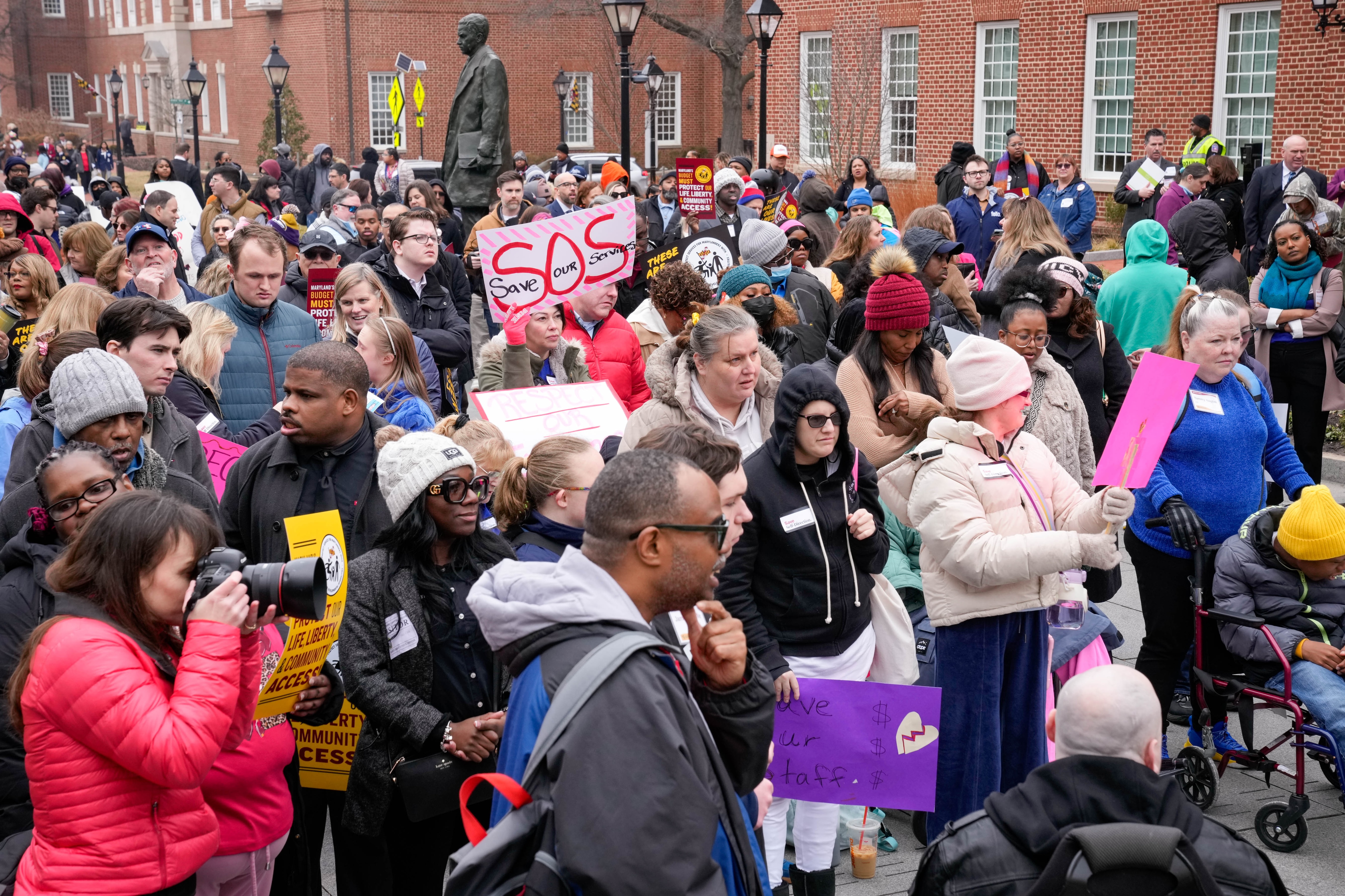 Demonstrators join a rally held by the the Maryland Developmental Disabilities Coalition on Lawyers Mall in Annapolis last month. People with developmental disabilities — as well as their families and caregivers — are concerned about $150 million in proposed cuts to the state Developmental Disabilities Administration. 
