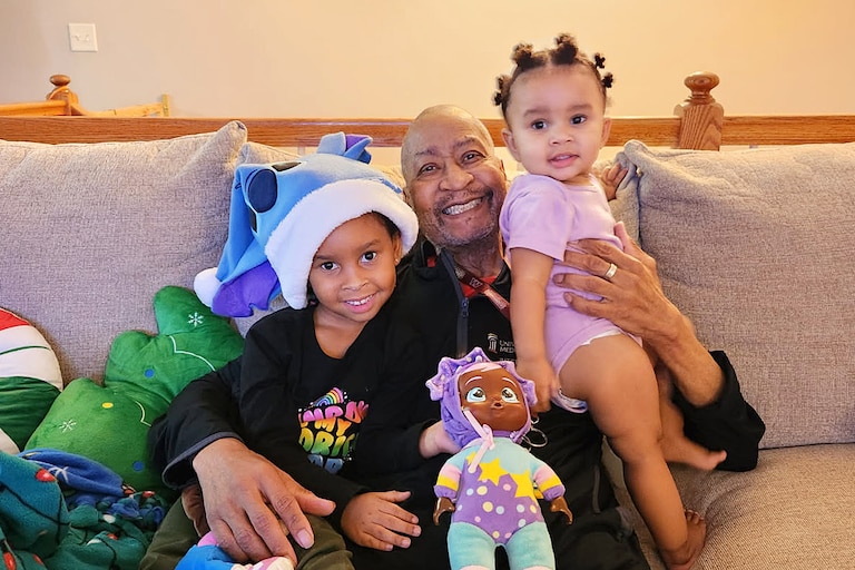 Iris Cormier with his granddaughters Ava and Zoe.