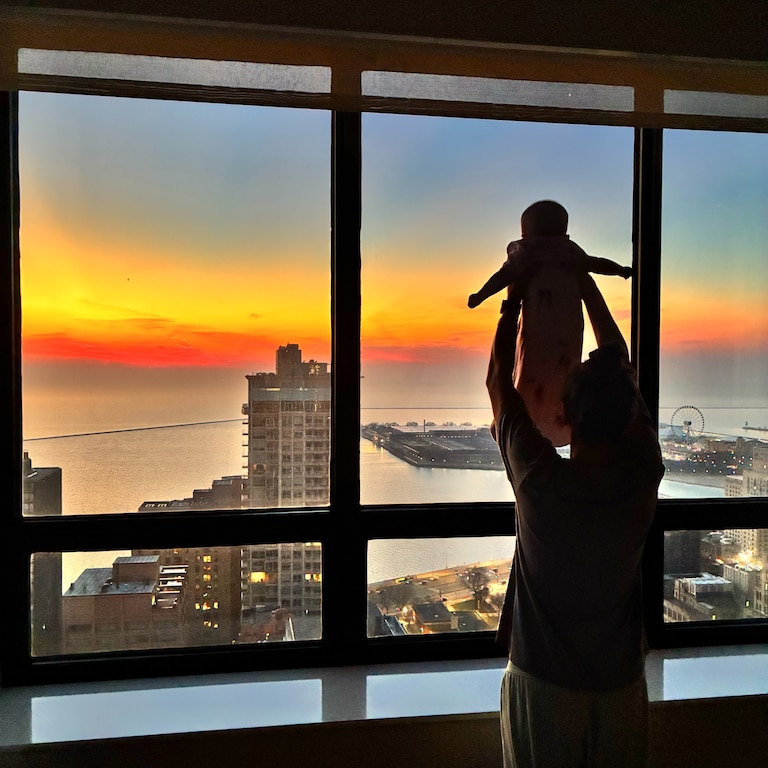 Caroline Margolis shows Blair Butera the view from the team's hotel in Chicago.
