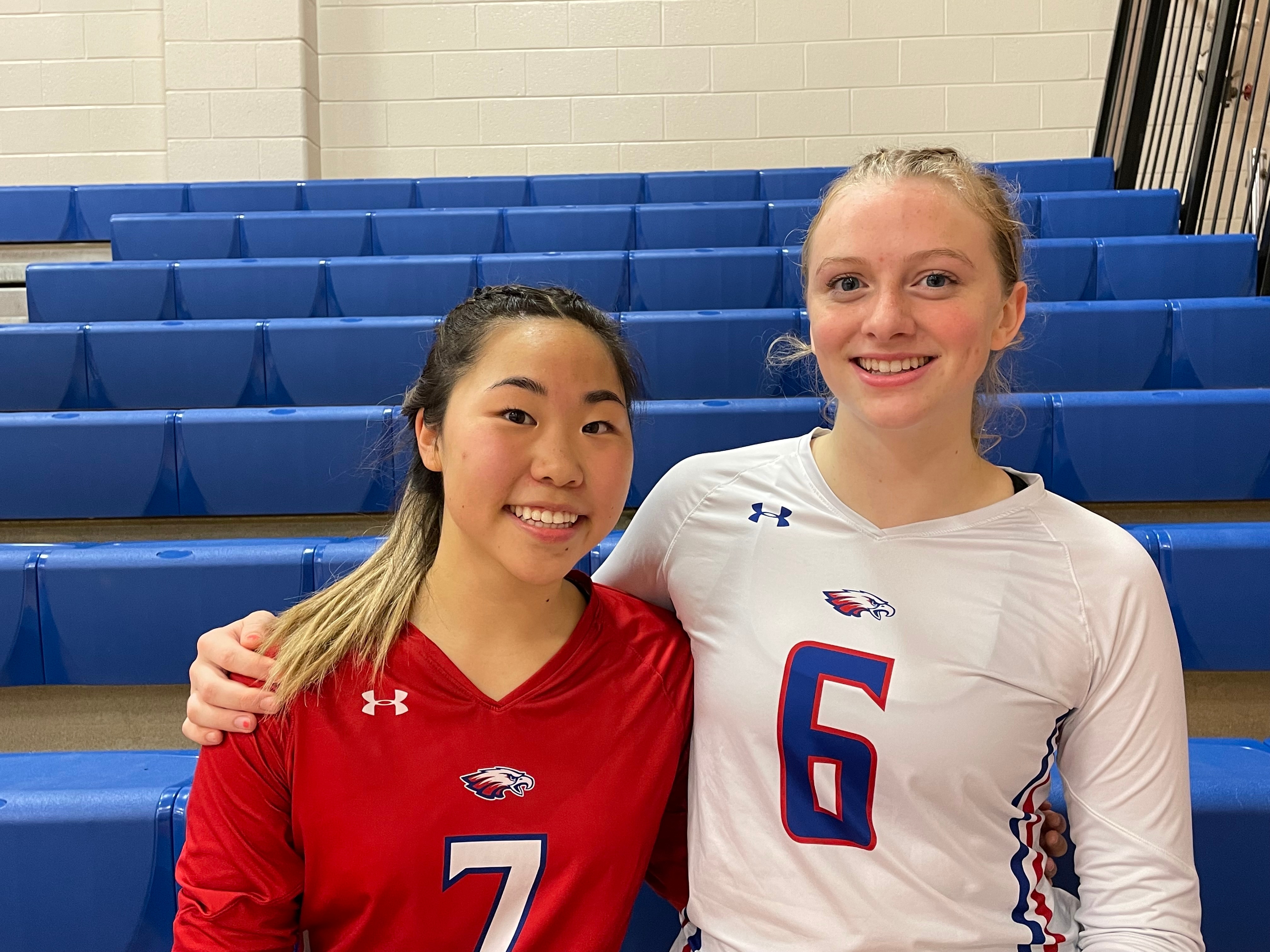 Centennial libero Caleigh Kim (left) led a stellar back row defense and middle hitter Kaley Maclellan finished off five the last seven points of the match as the No. 3 Eagles defeated No. 2 Reservoir, 3-2, in a clash of two teams previously unbeaten in Howard County.