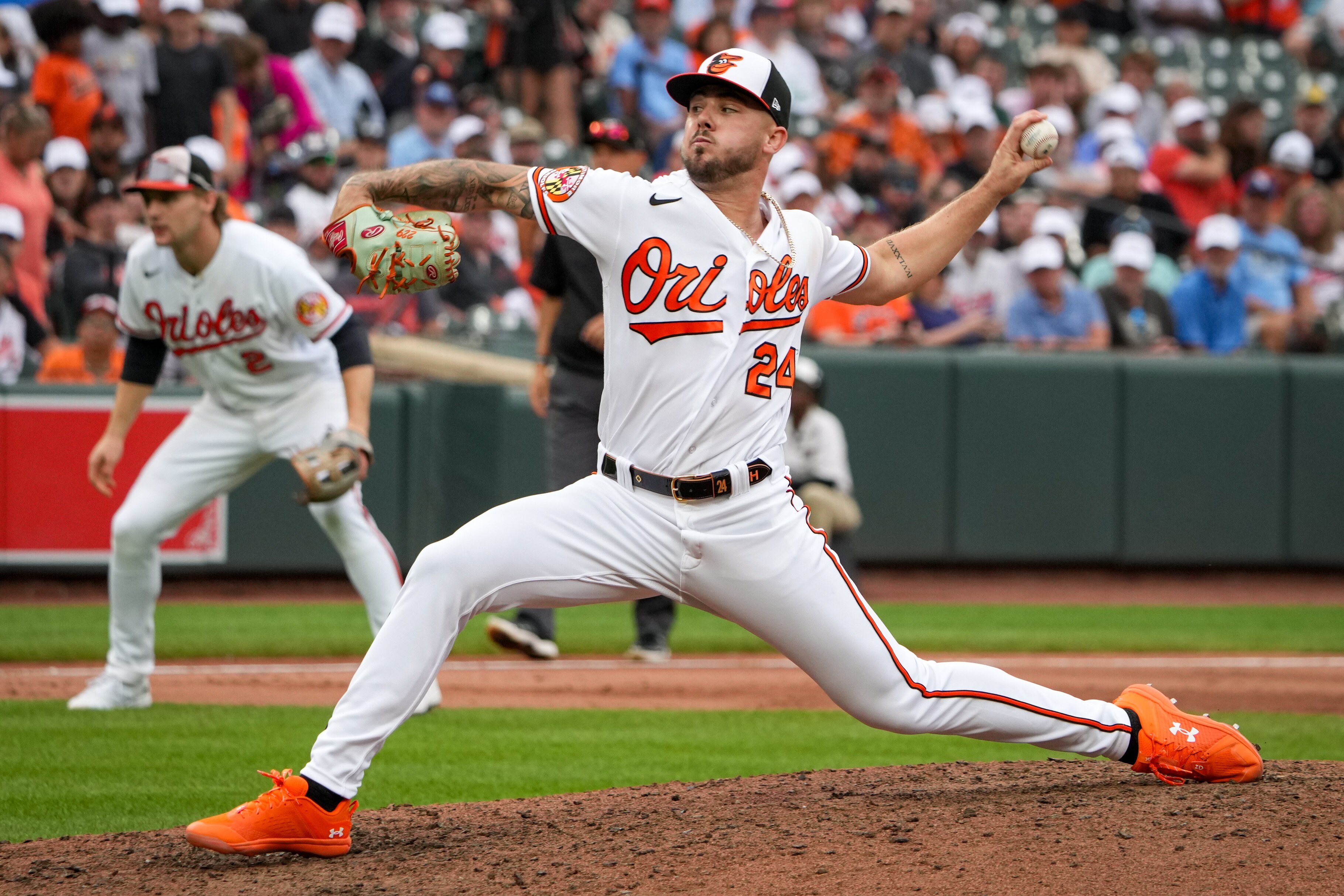 Baltimore Orioles relief pitcher DL Hall (24) pitches in the 11th inning of a baseball game against the Tampa Bay Rays on Sunday, Sept. 17, 2023.