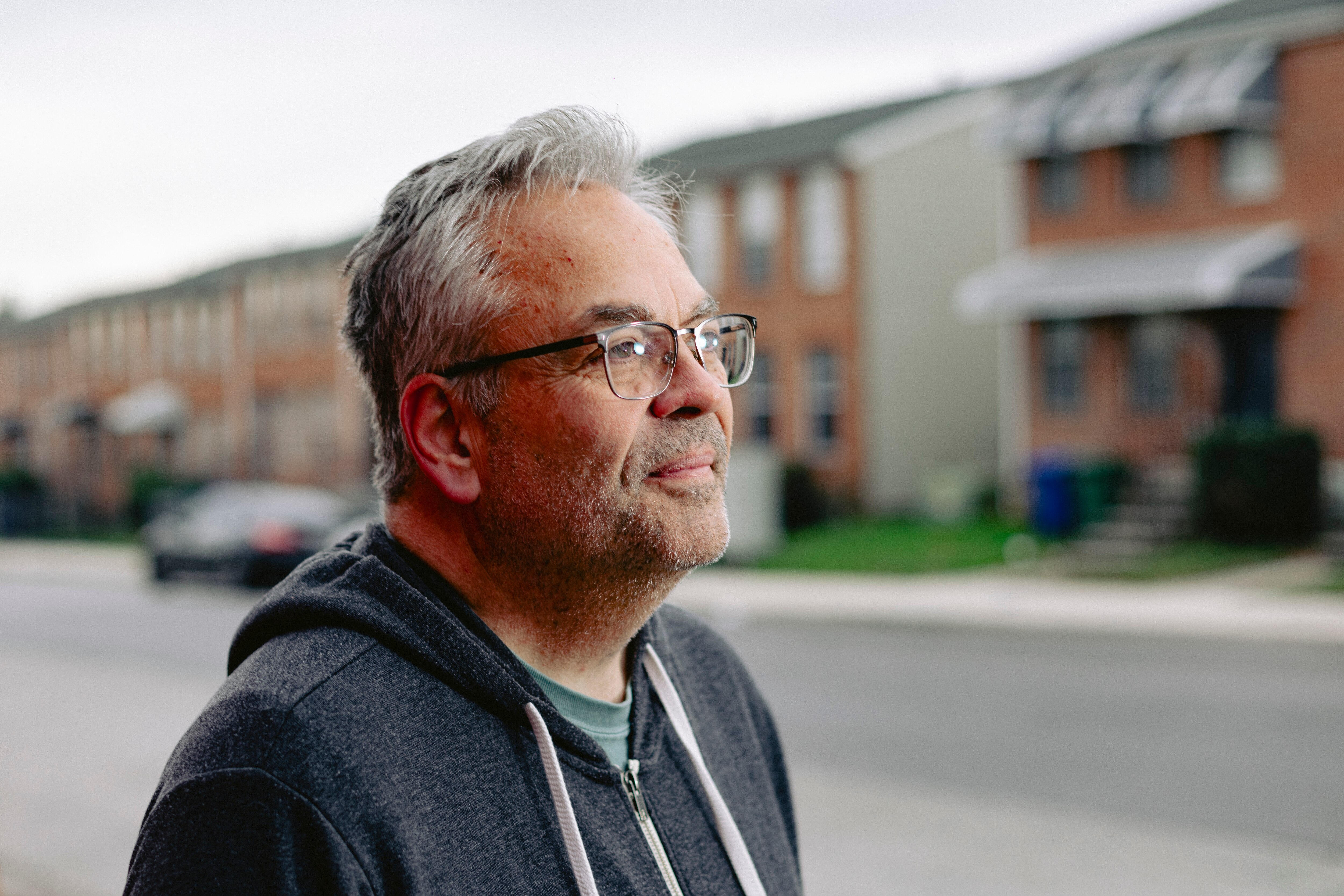 Michael Lisicky stands on a section of Francis Street which he hasn’t yet run, on Thursday, Dec. 7, 2023 in Baltimore, MD. Lisicky has been on a mission to run on every street in Baltimore since the summer.