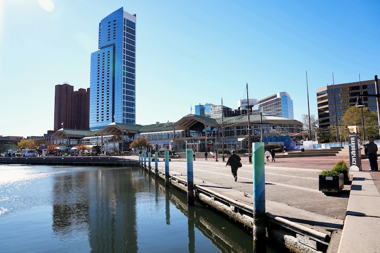 Water levels are low in Baltimore's Inner Harbor as the tide starts to come in on Thursday.