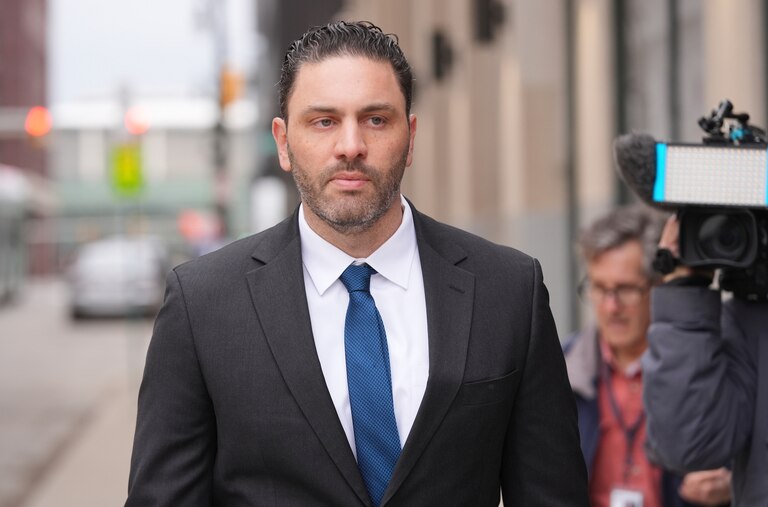 Former Ravens and University of Michigan assistant football coach Matt Weiss leaves federal court in Detroit, Monday, March 24, 2025. (AP Photo/Paul Sancya)