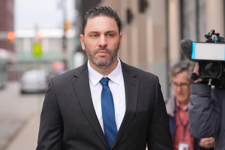 Former Ravens and University of Michigan assistant football coach Matt Weiss leaves federal court in Detroit, Monday, March 24, 2025. (AP Photo/Paul Sancya)
