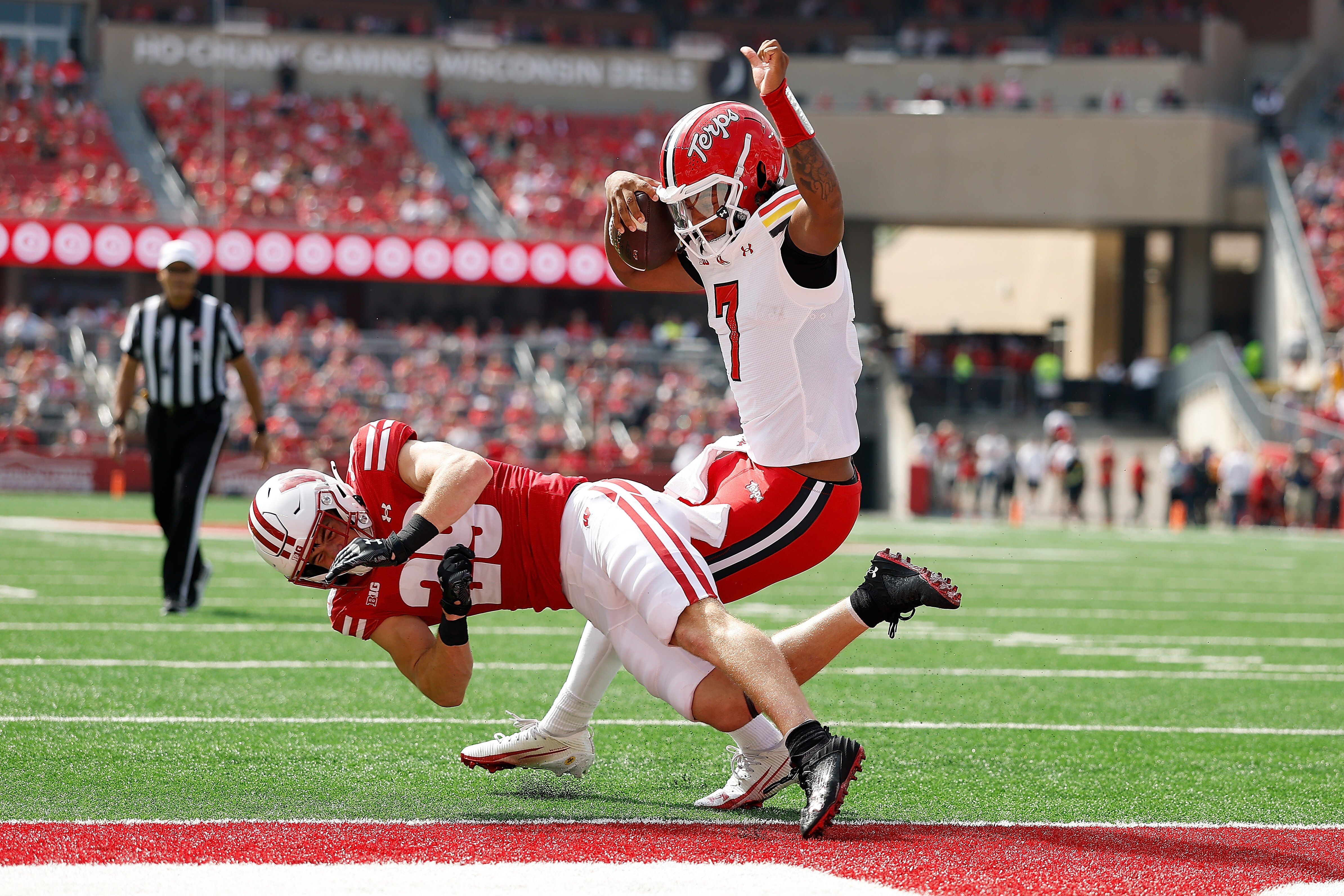 Maryland quarterback Malik Washington scores a 1-yard touchdown in the first quarter Saturday during the Terrapins’ 27-10 win at Wisconsin.