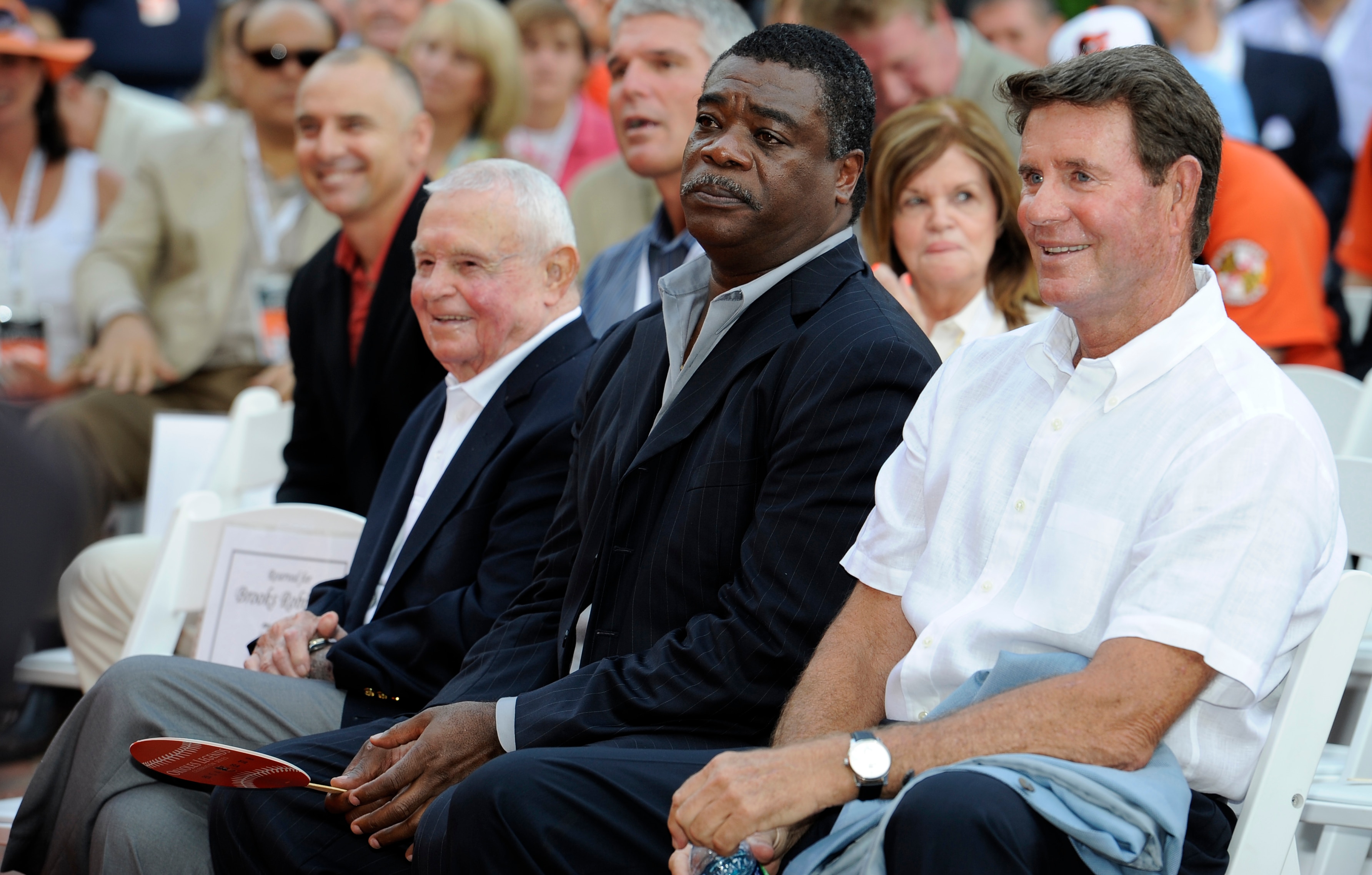 Former Orioles manager Earl Weaver and pitcher Jim Palmer flank Eddie Murray during a ceremony honoring Cal Ripken Jr. in 2012.