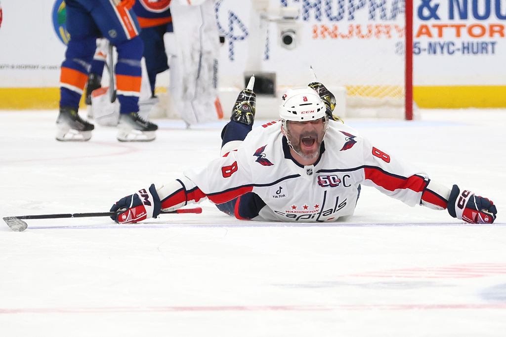 Alex Ovechkin #8 of the Washington Capitals celebrates after scoring his 895th career goal.