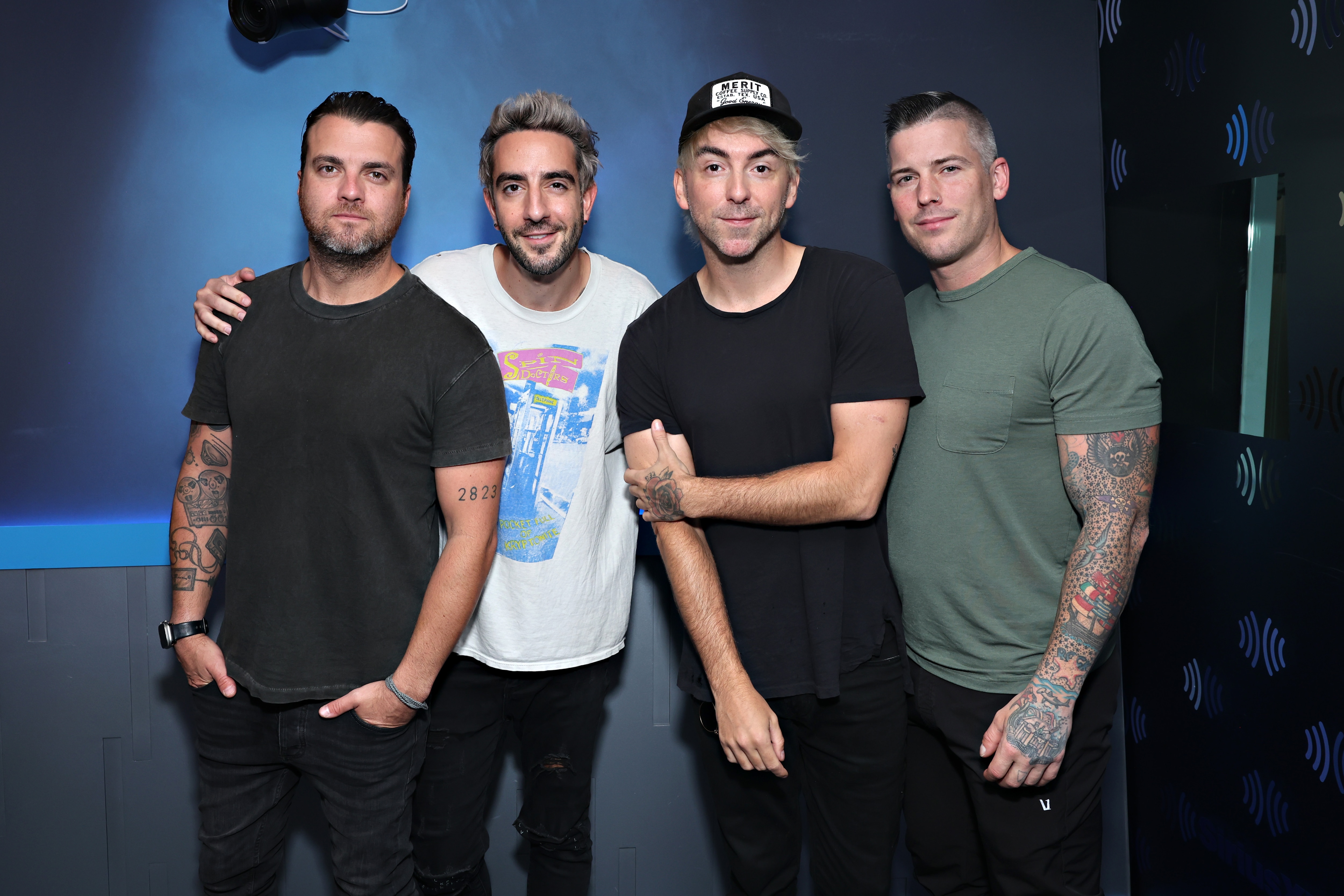 Robert Rian Dawson, Jack Barakat, Alex Gaskarth and Zack Merrick of All Time Low. The band will celebrate their 20th anniversary at Merriweather Post Pavilion.