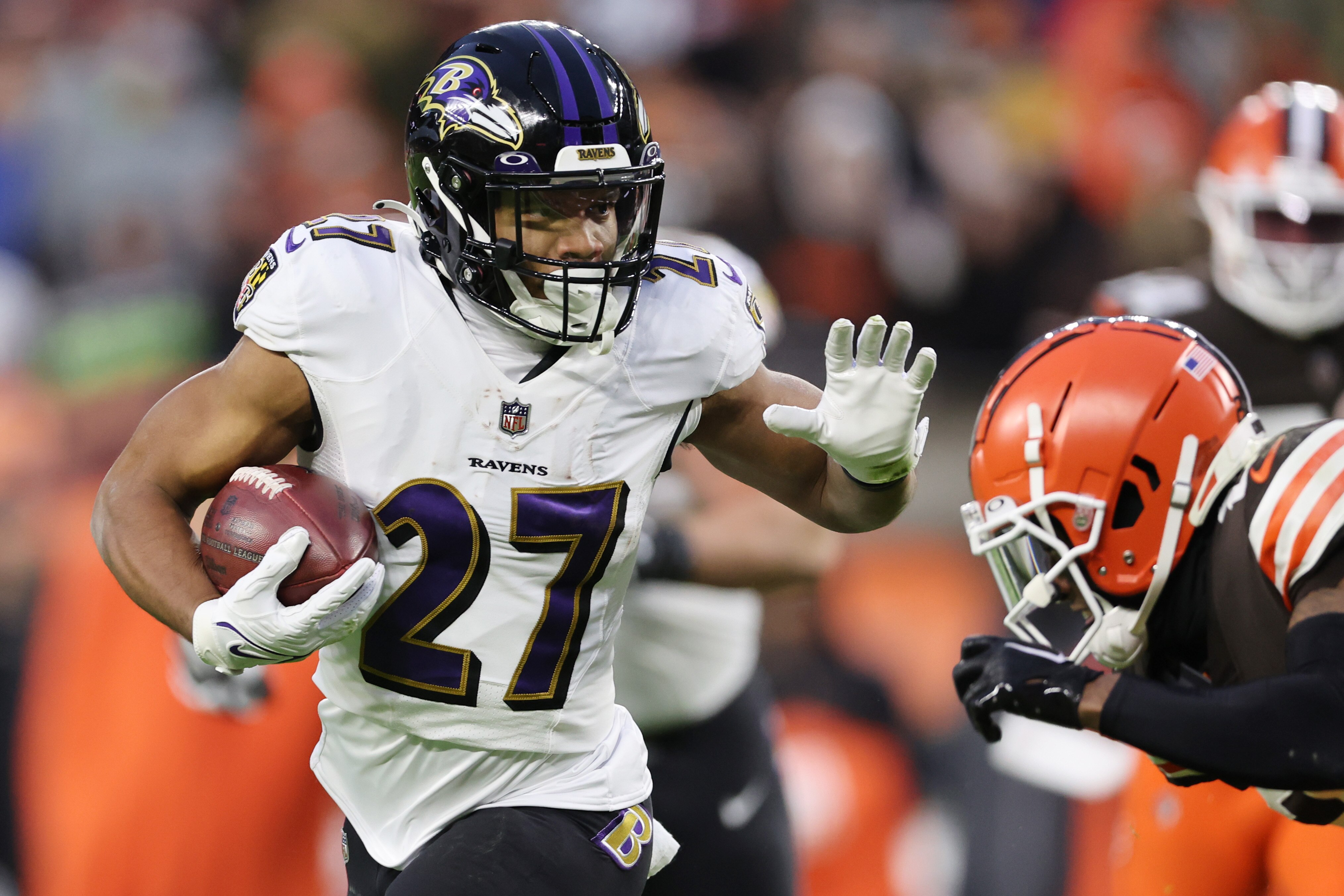 J.K. Dobbins, No. 27 of the Baltimore Ravens, carries the ball against the Cleveland Browns during the first quarter at FirstEnergy Stadium on Dec. 17, 2022 in Cleveland, Ohio.