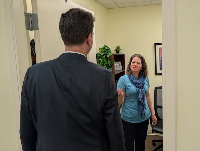 Neilye Garrity, chief of staff to Annapolis Mayor Jared Littmann, talks to the mayor on April 10, 2026 from her office just outside his at City Hall.
