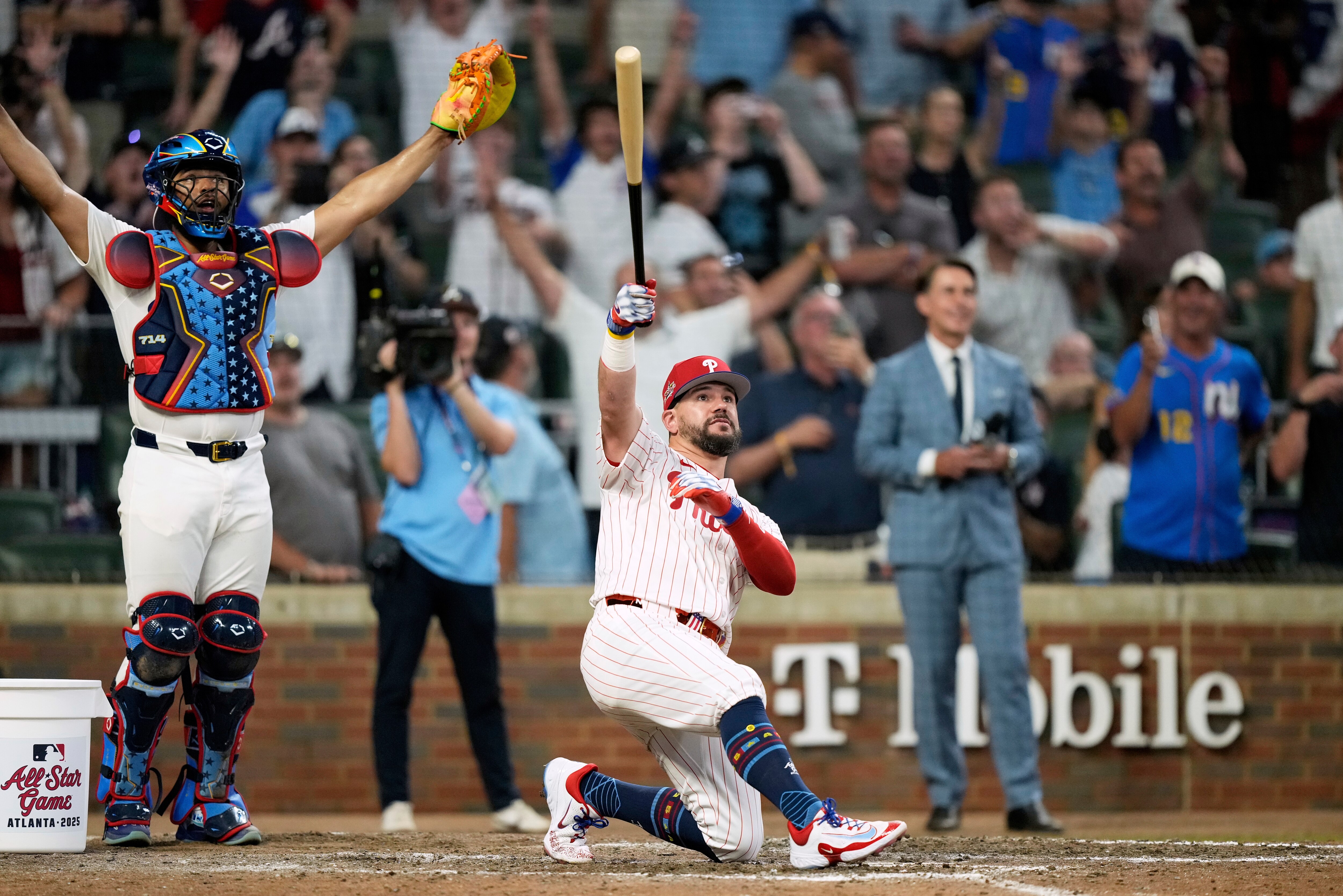 Philadelphia Phillies Kyle Schwarber celebrates after hitting his third home run in the swing-off to decide the All-Star Game. (AP Photo/Brynn Anderson)