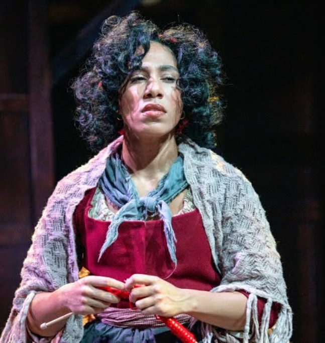 Luisa Turner plays Madame Defarge, a vengeful leader of the French Revolution who knits death warrants for aristocrats.