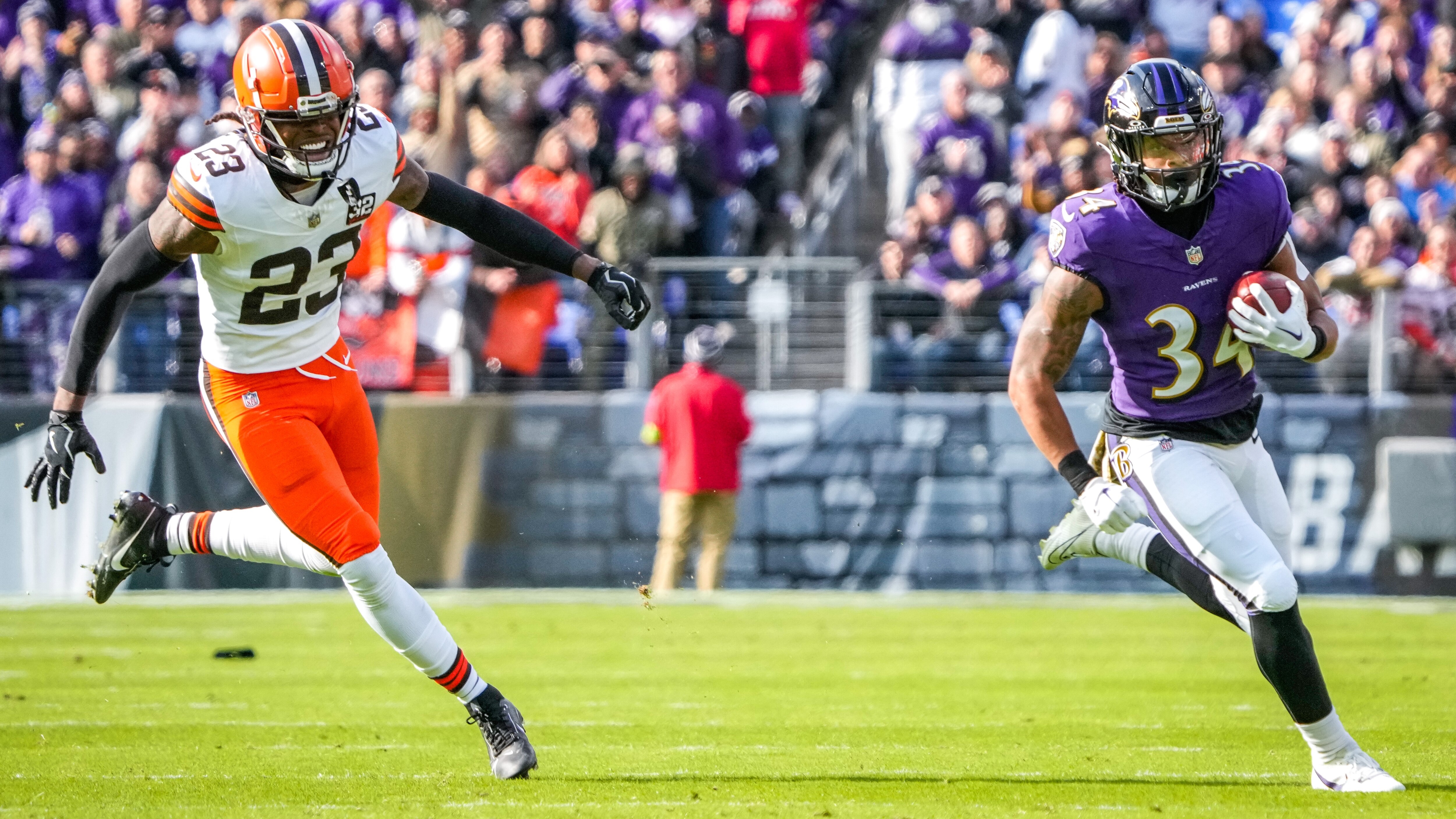 Baltimore Ravens running back Keaton Mitchell (34) runs down the field during the first quarter against the Cleveland Browns at M&T Bank Stadium on Sunday, Nov. 12, 2023.