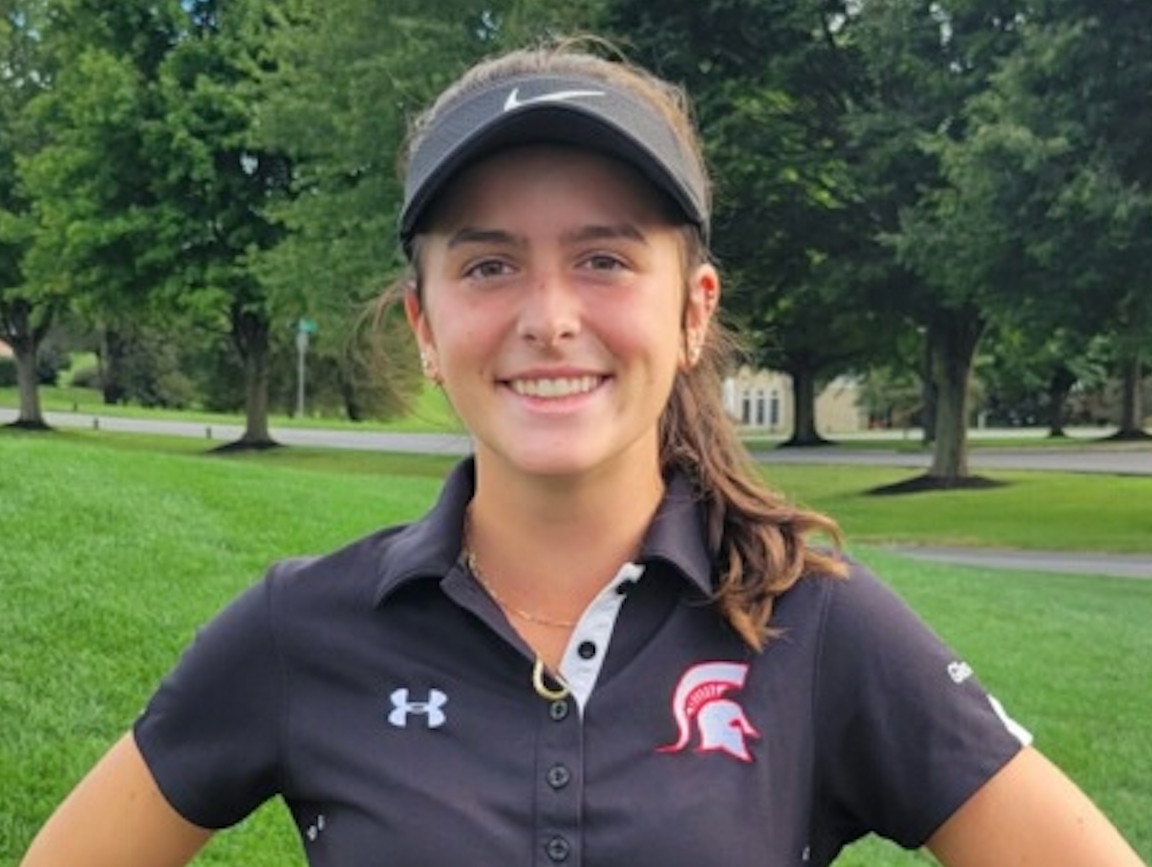 Megan Kirkpatrick poses for a photo after her 5-under par round of 32 points at Cattail Creek on Thursday.