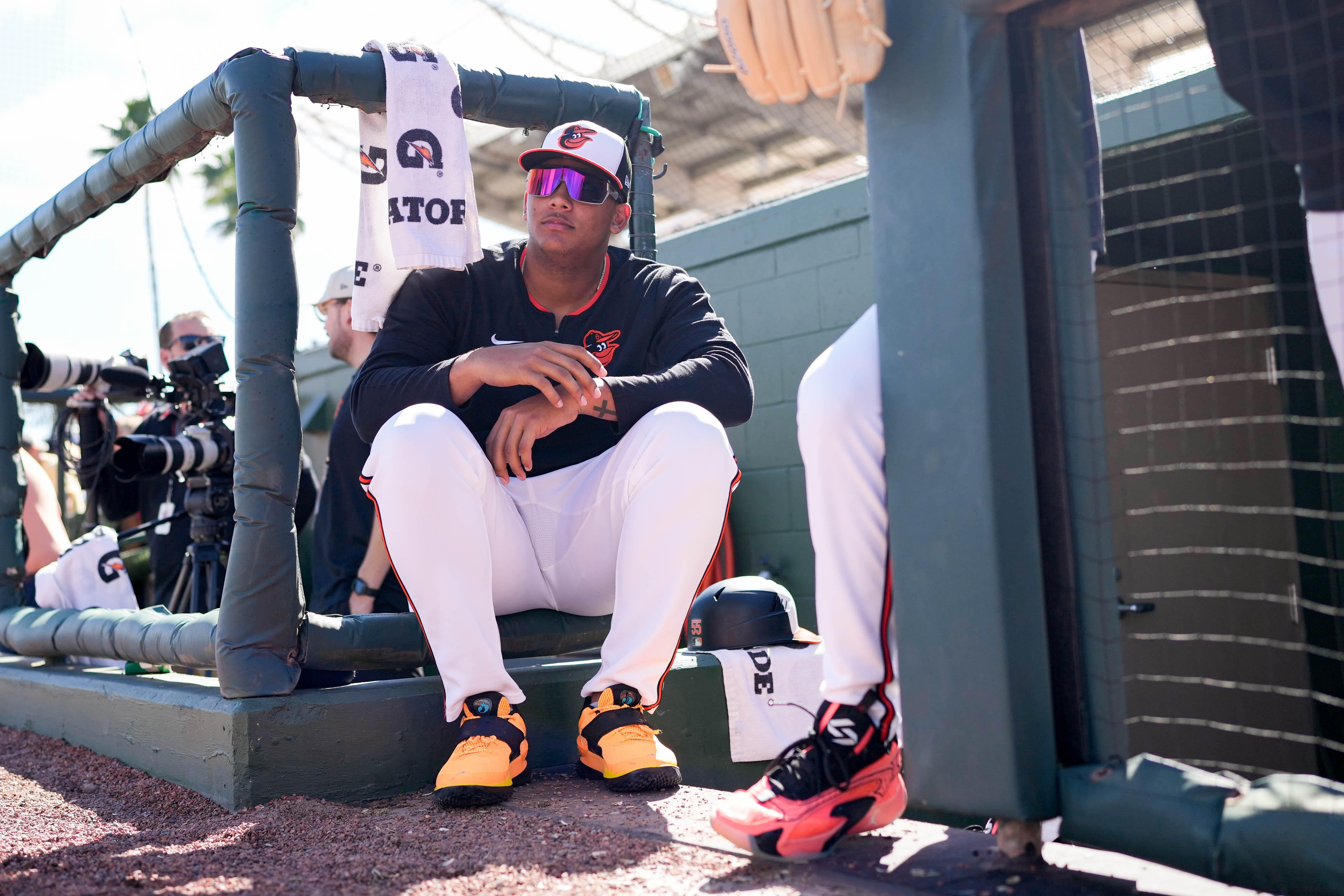 Baltimore Orioles catching prospect Samuel Basallo watches his teammates play a Grapefruit League game against the Detroit Tigers at Ed Smith Stadium in Sarasota, Fla. on Tuesday, Feb. 25, 2025.
