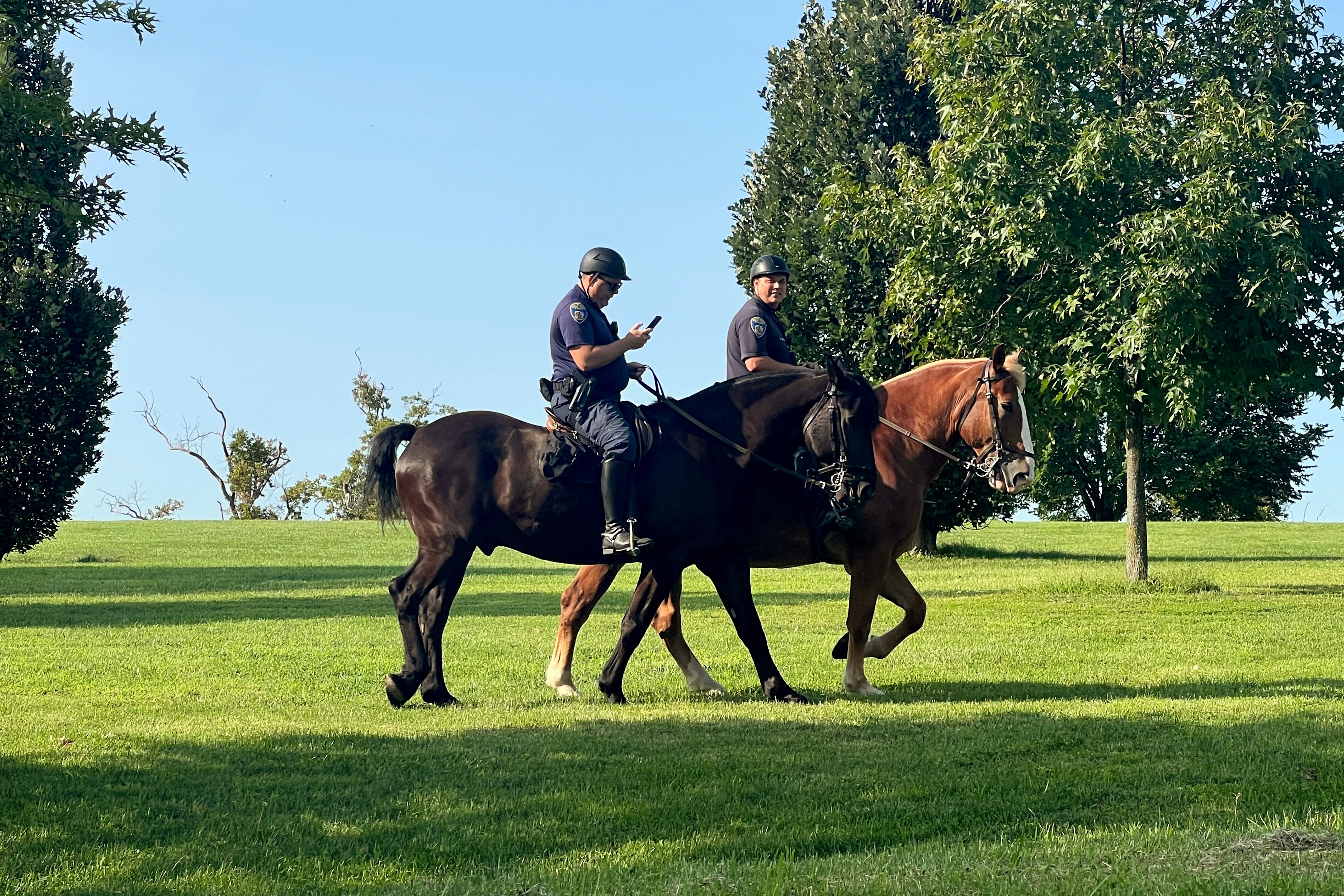 Mounted police officers at Fort McHenry in 2024. After cutting funding for its mounted unit in 2020, the city will wind down the unit's operations this year.