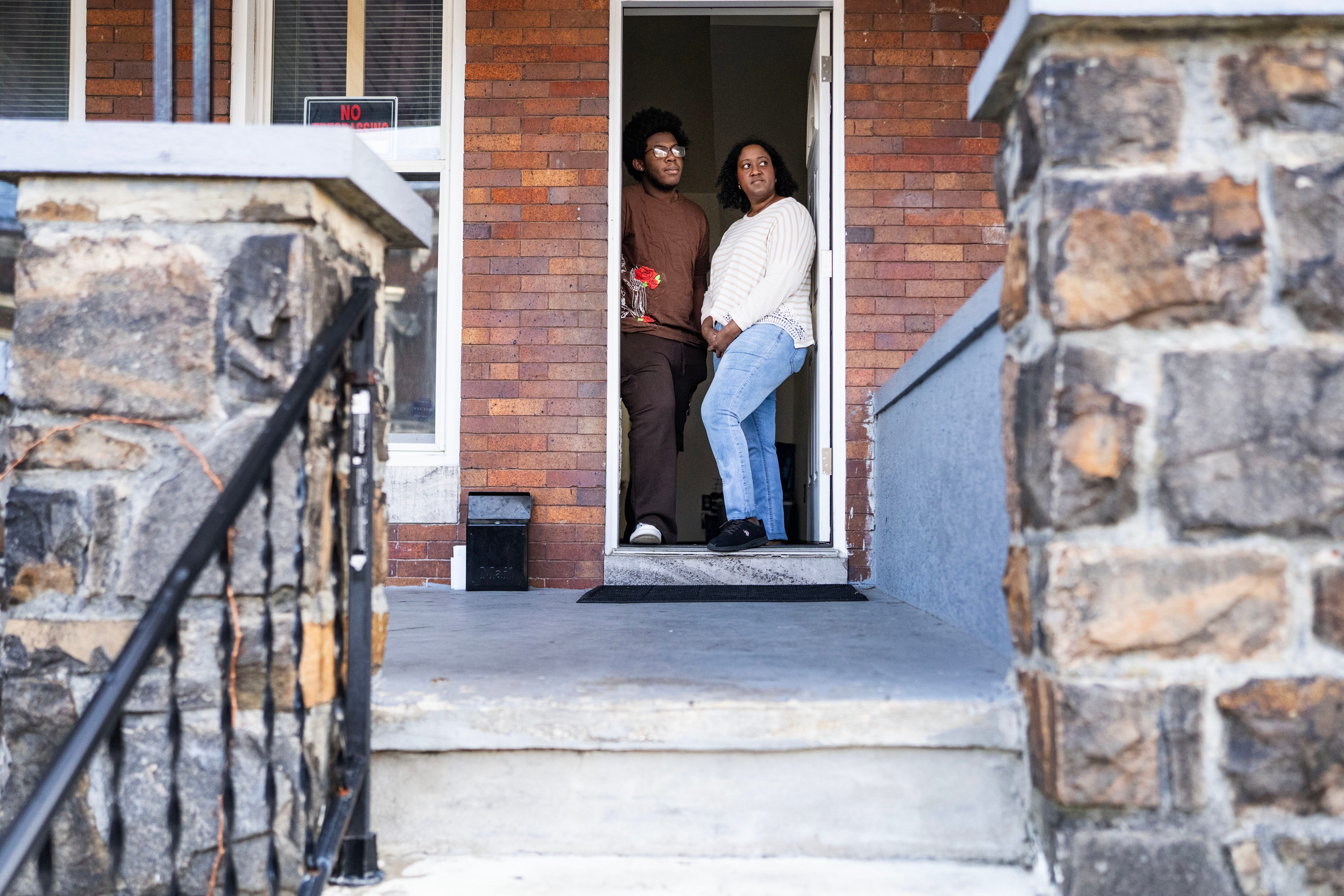 Jalen Absolum and his sister, Janiene Smith, at their home in West Baltimore after finally being able to move in.