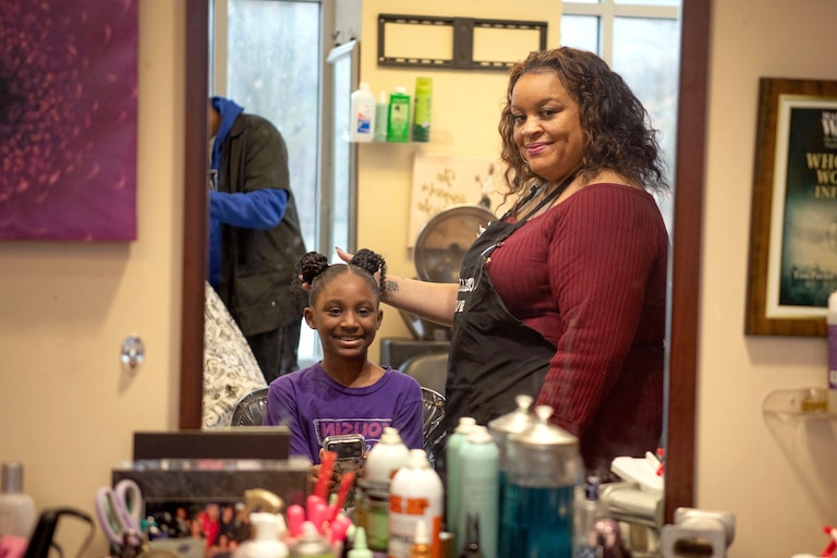Winners of "The Crown Commitment". Girls with excellent school attendance were awarded with free professional hairstyling services.