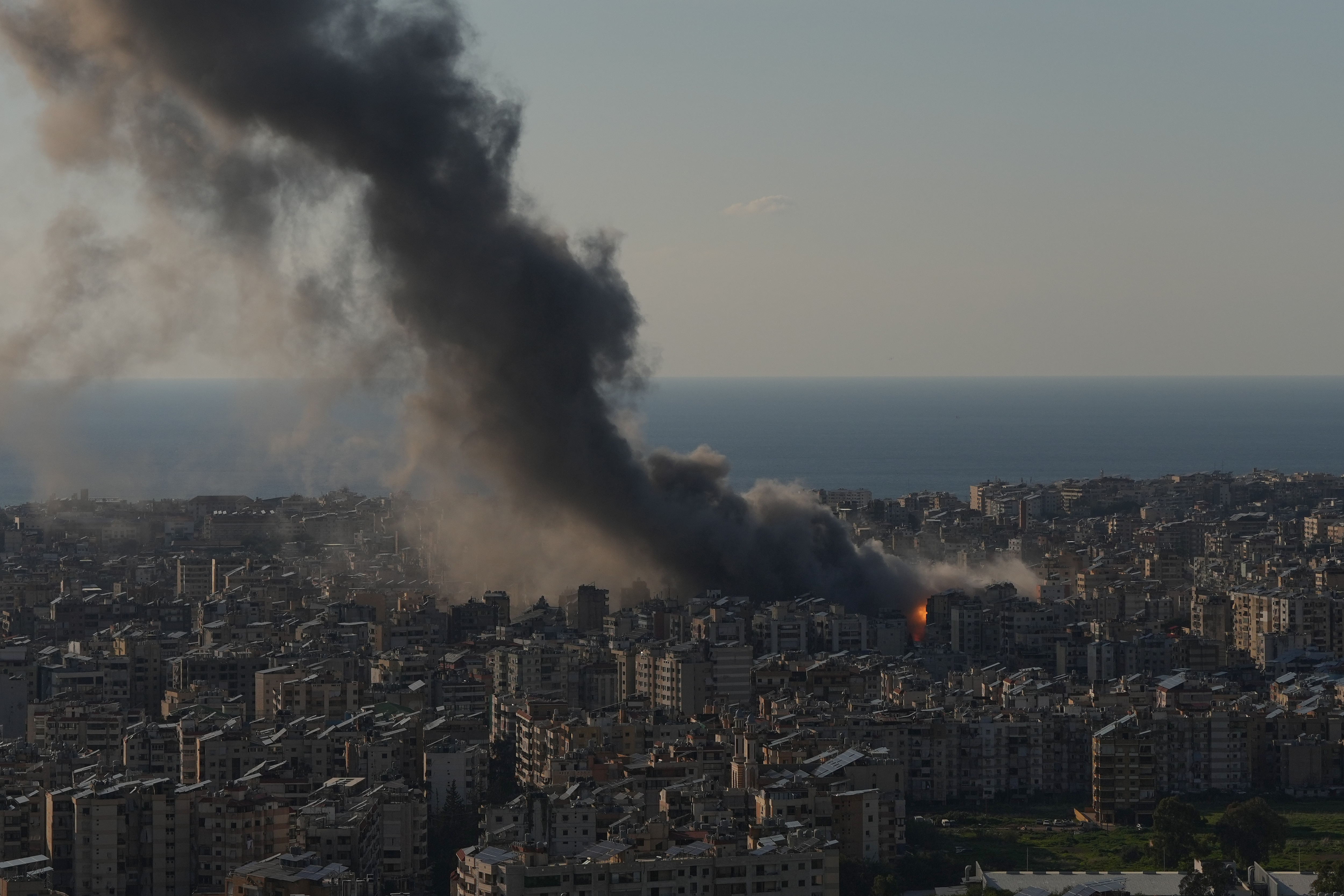 Flames and smoke rise from Israeli airstrikes on Dahiyeh, a southern suburb of Beirut, Lebanon.