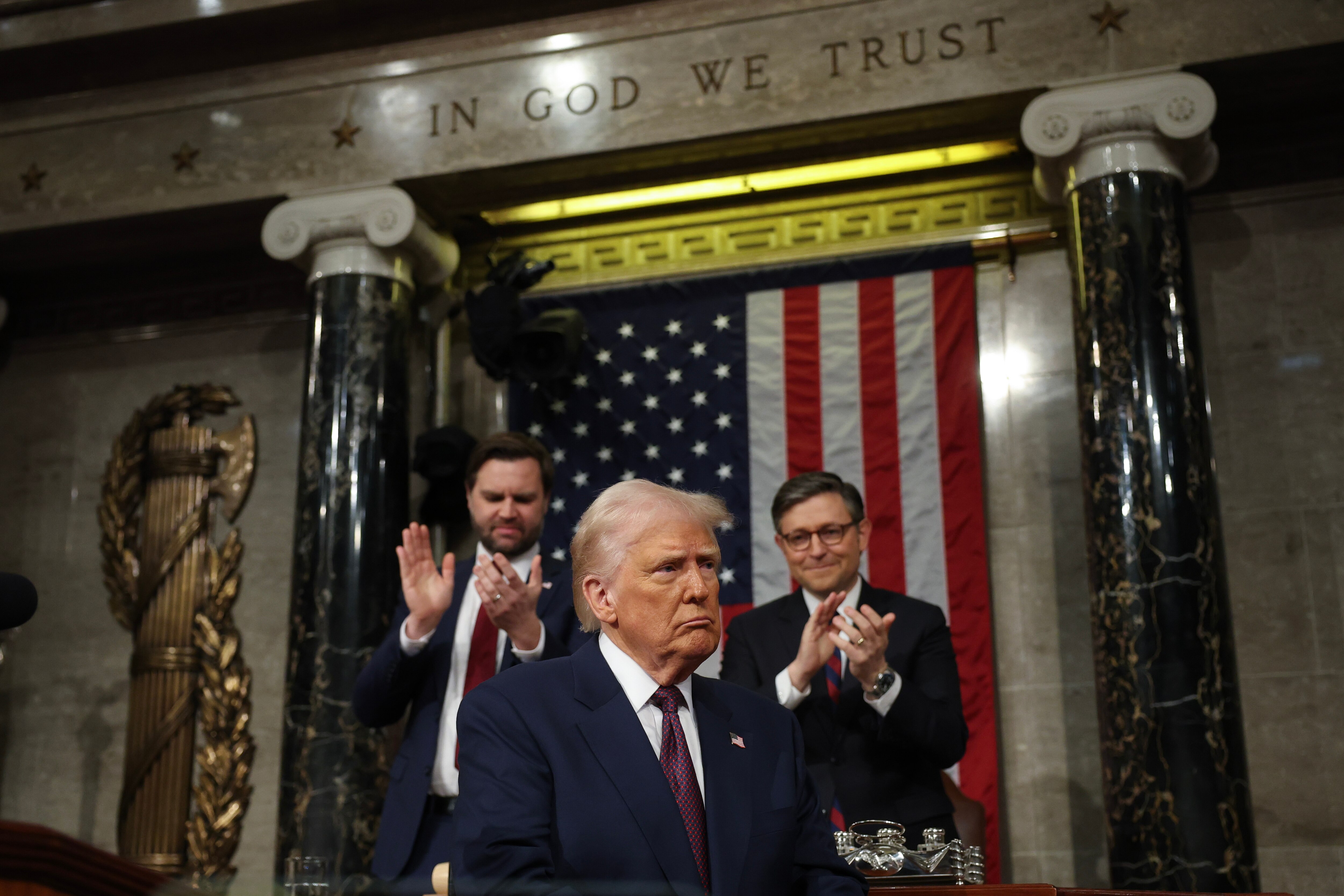 WASHINGTON, DC - MARCH 04: U.S. President Donald Trump addresses a joint session of Congress at the U.S. Capitol on March 04, 2025 in Washington, DC. Vice President JD Vance and Speaker of the House Mike Johnson (R-LA) applaud behind him. President Trump was expected to address Congress on his early achievements of his presidency and his upcoming legislative agenda.