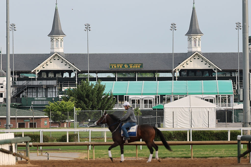 Horses train beneath the twin spires during morning workouts ahead of the running of the 152nd Kentucky Derby.