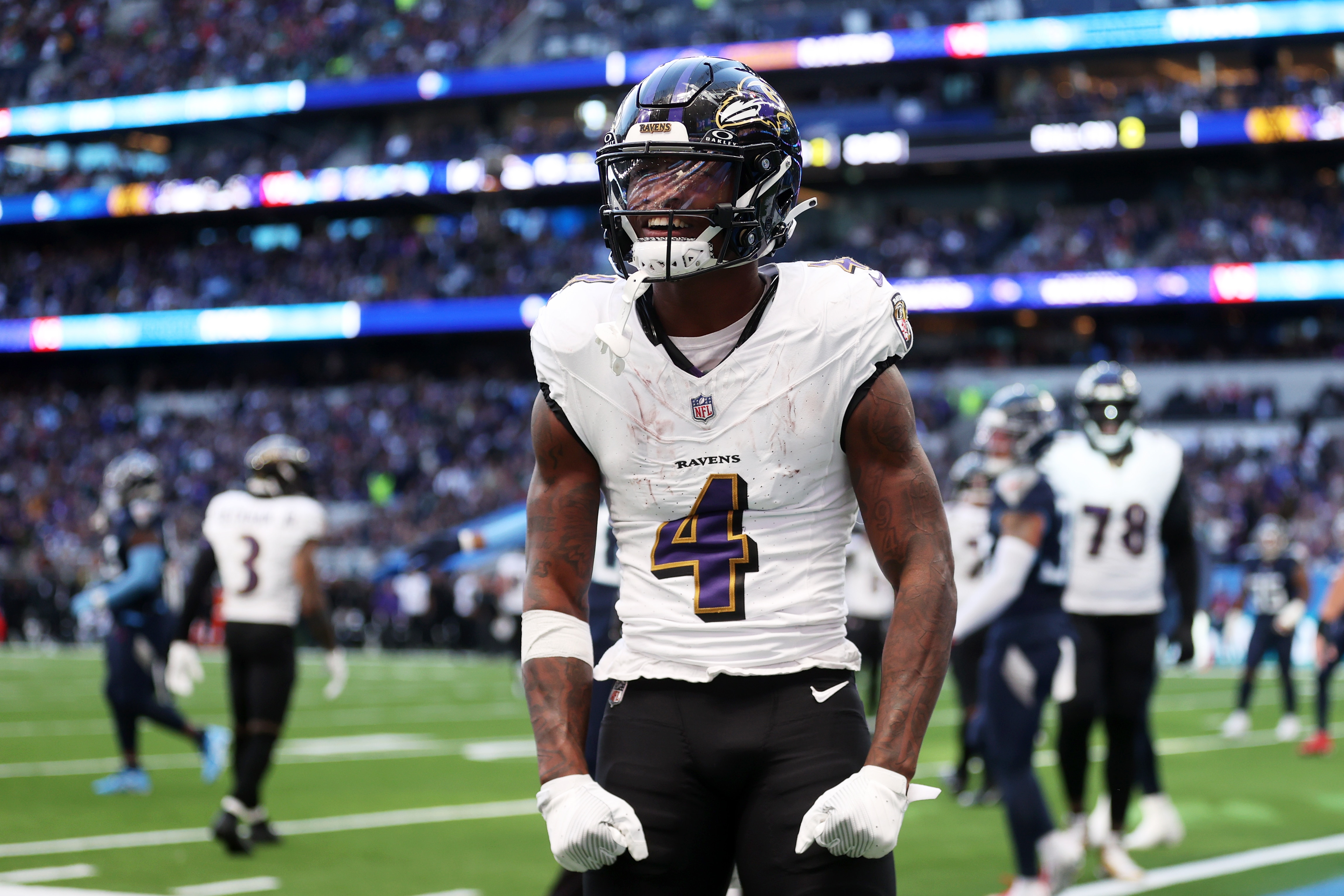 Zay Flowers celebrates his first NFL score, the Ravens' only touchdown in Sunday's 24-16 win over the Tennessee Titans in London.