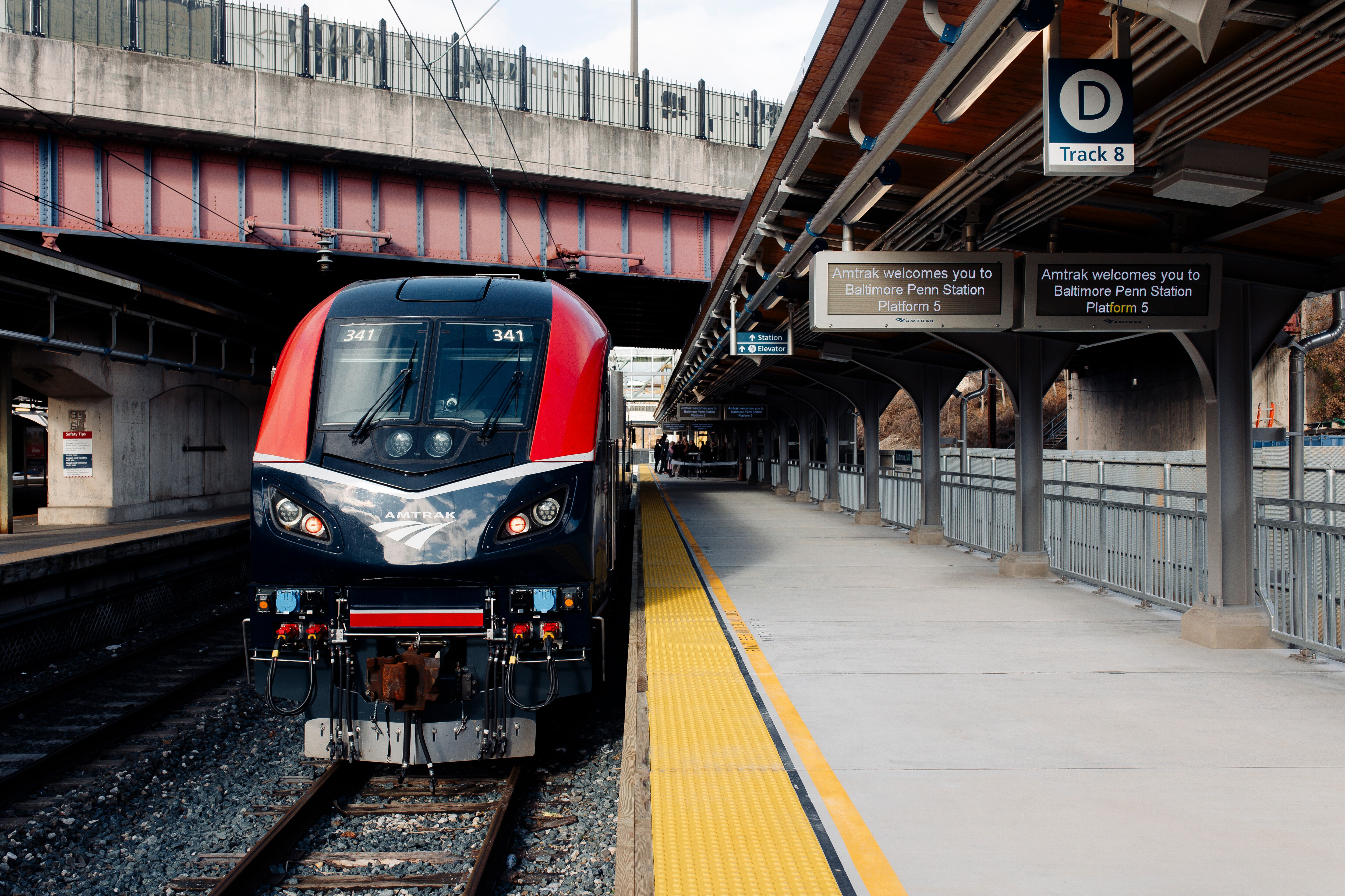 An Amtrak train is stopped in Penn Station’s newly constructed platform 5 before the opening event for the platform on Monday, Jan. 29, 2024 in Baltimore, MD. (Wesley Lapointe / for the Baltimore Banner)