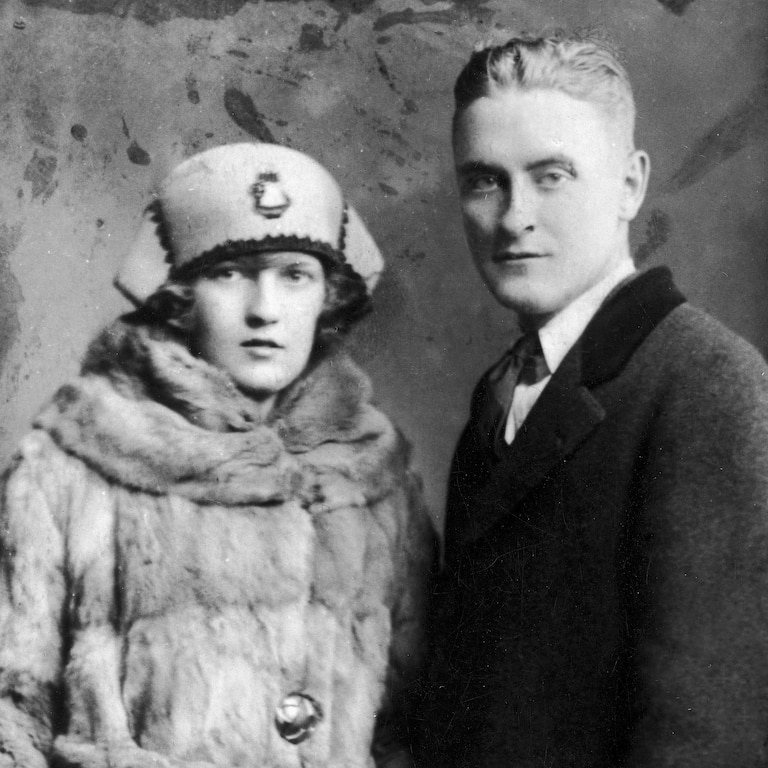 Portrait of American author F. Scott Fitzgerald (1896-1940) and his wife Zelda wearing winter coats.