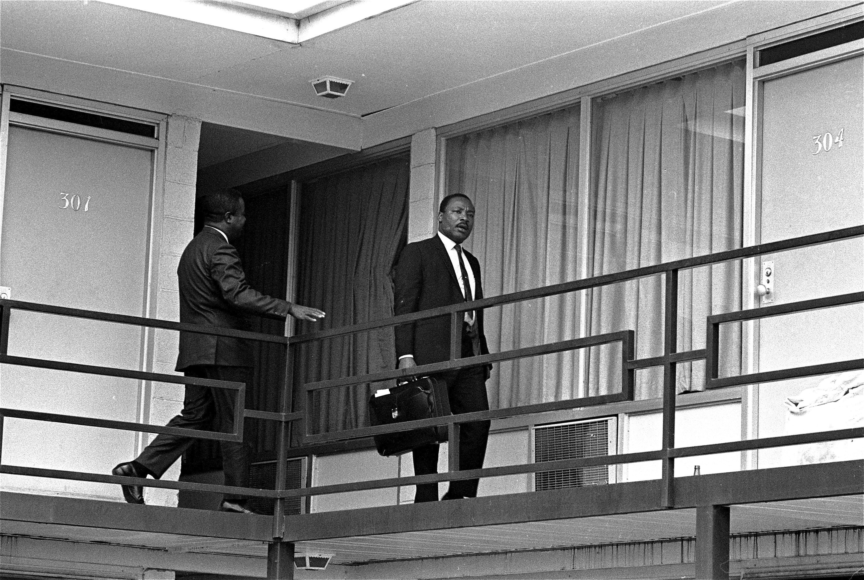Rev. Martin Luther King, Jr. walks across the balcony of the Lorraine Motel in Memphis, April 3, 1968